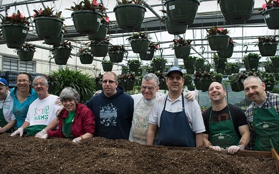 smile farms group planting photo