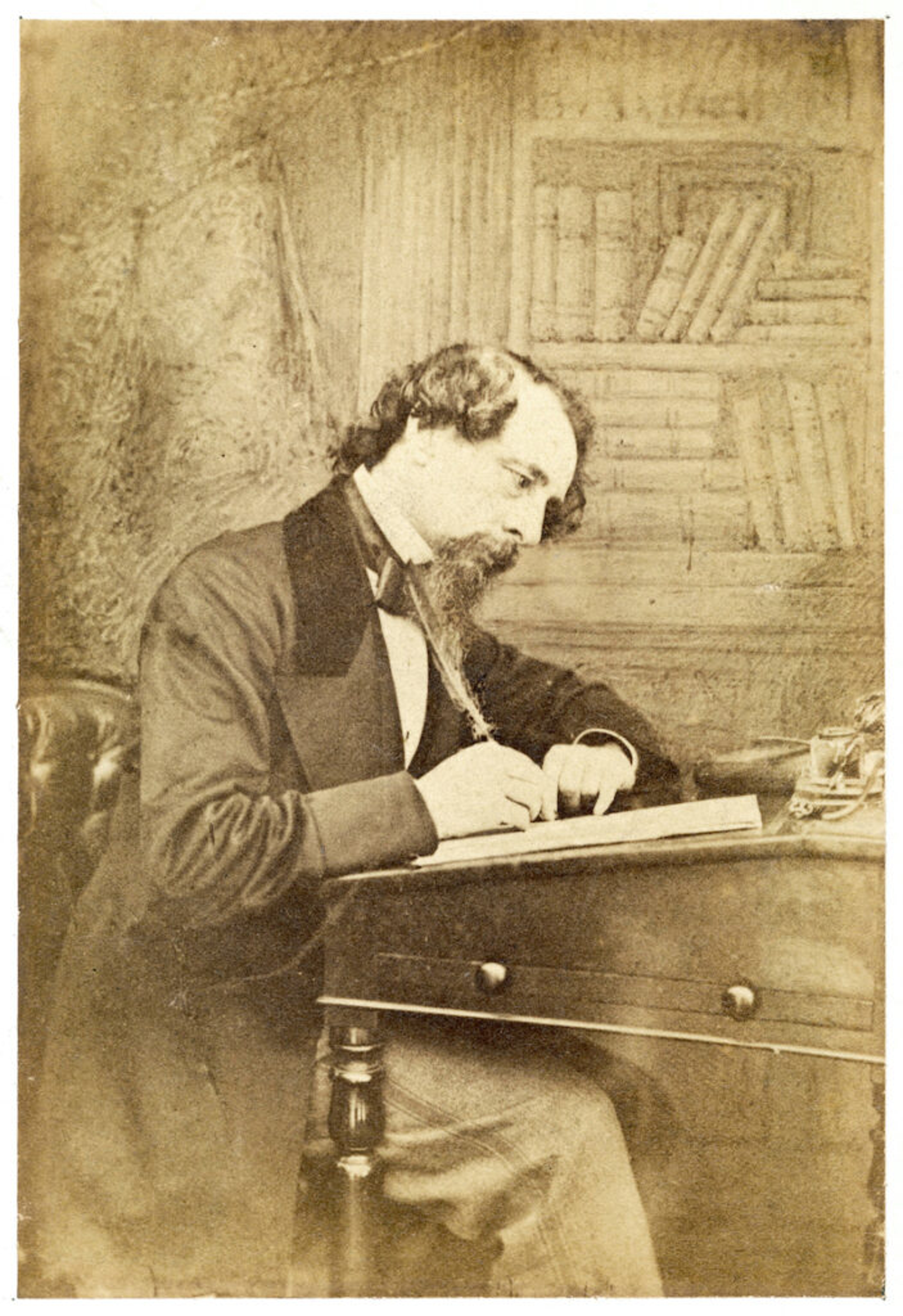 Charles Dickens writing after taking a walk.