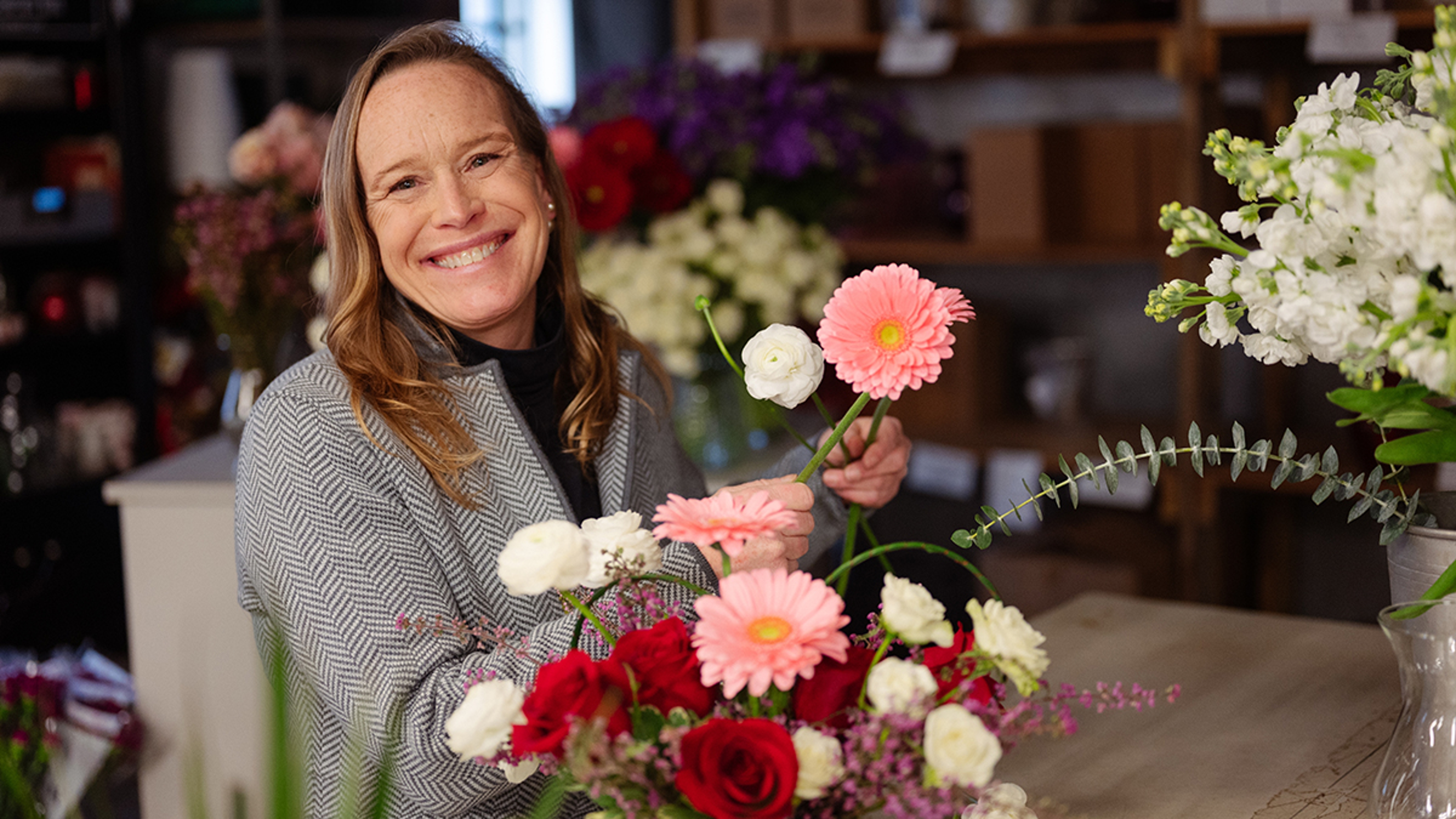 Article Cards Featured Image Local florist Patti Fowler arranges a collection of flowers