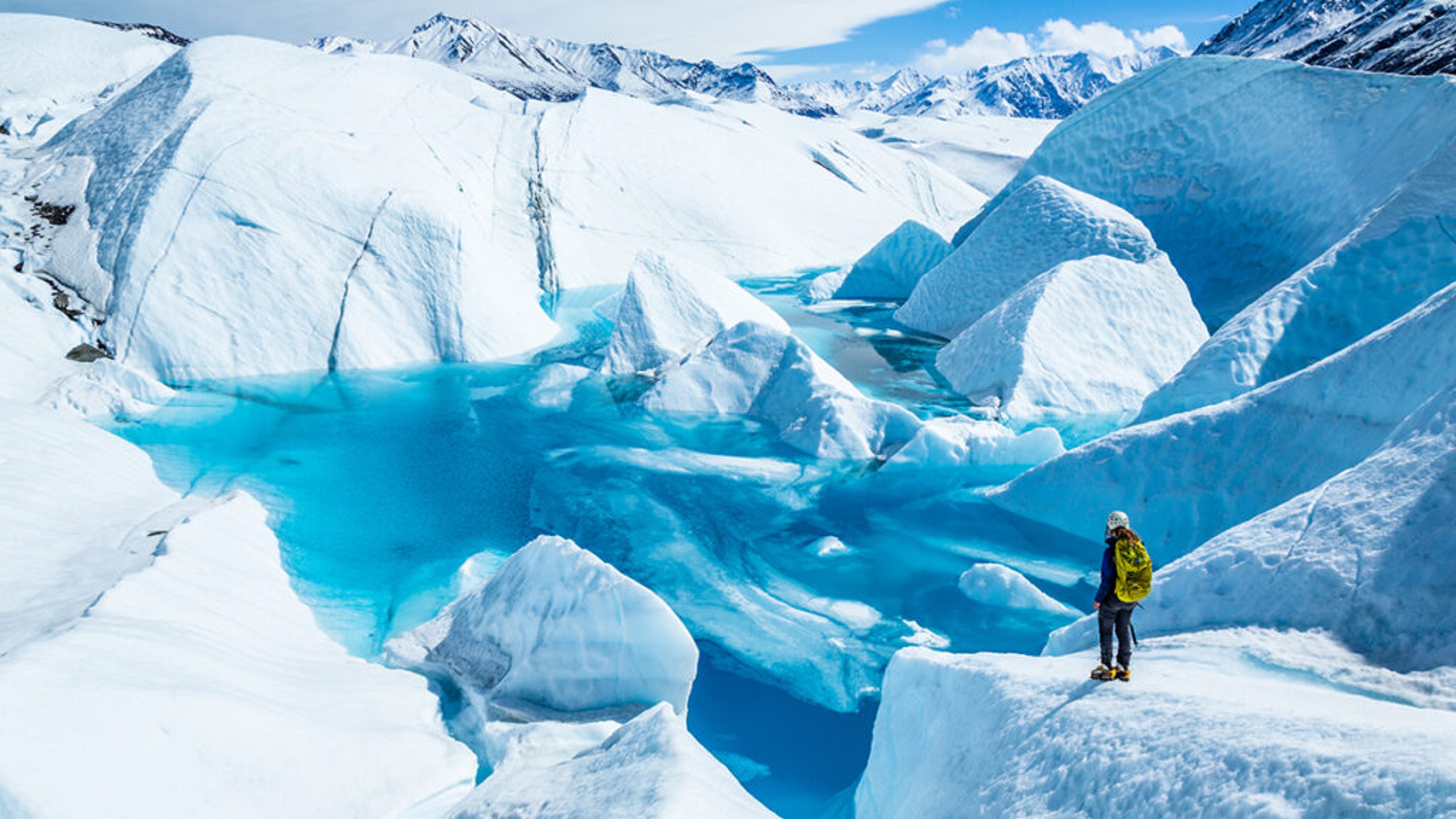 Mountaineer looking at Alaskan glacier
