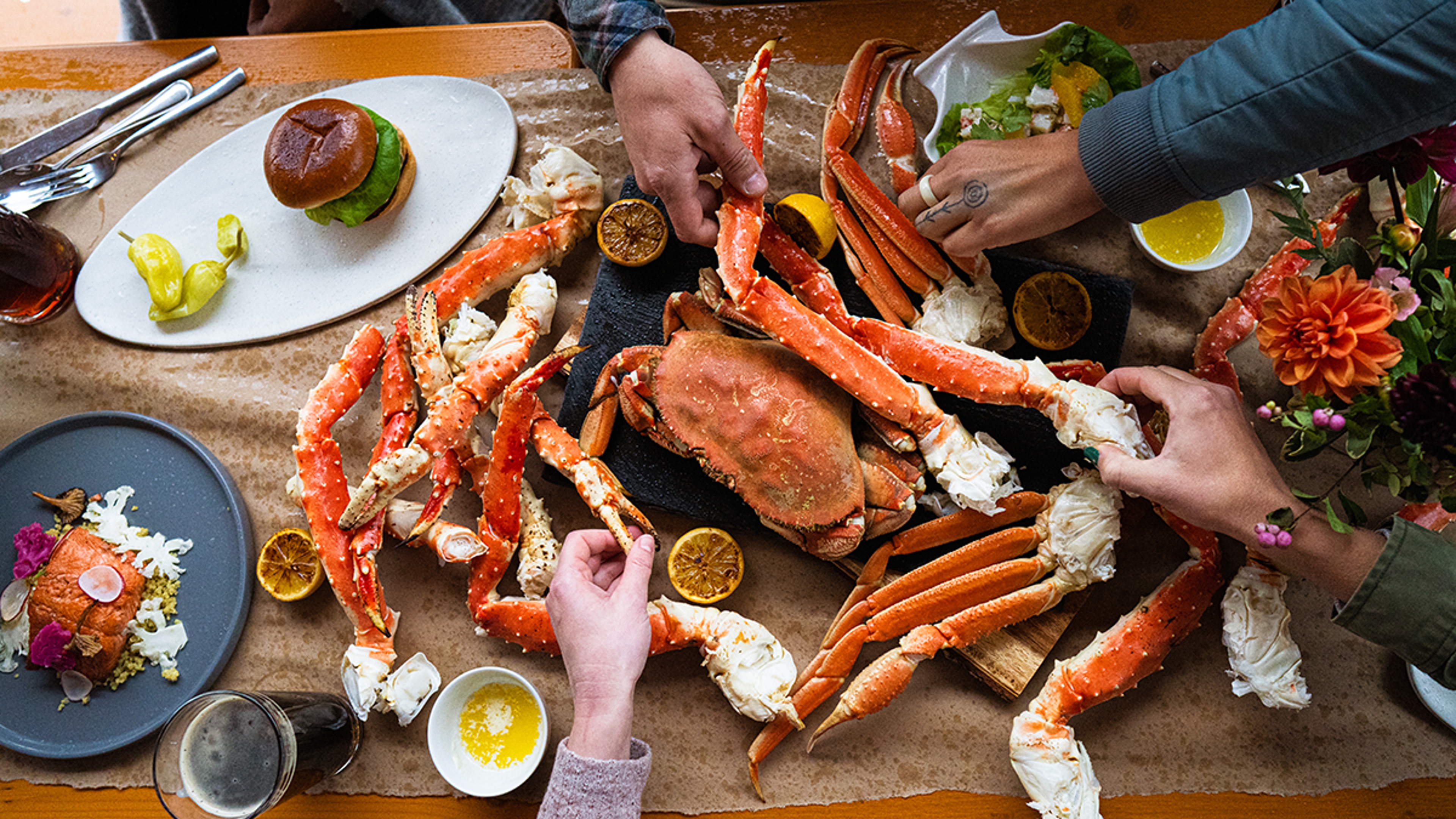 Golden king crab on a table with sauce.