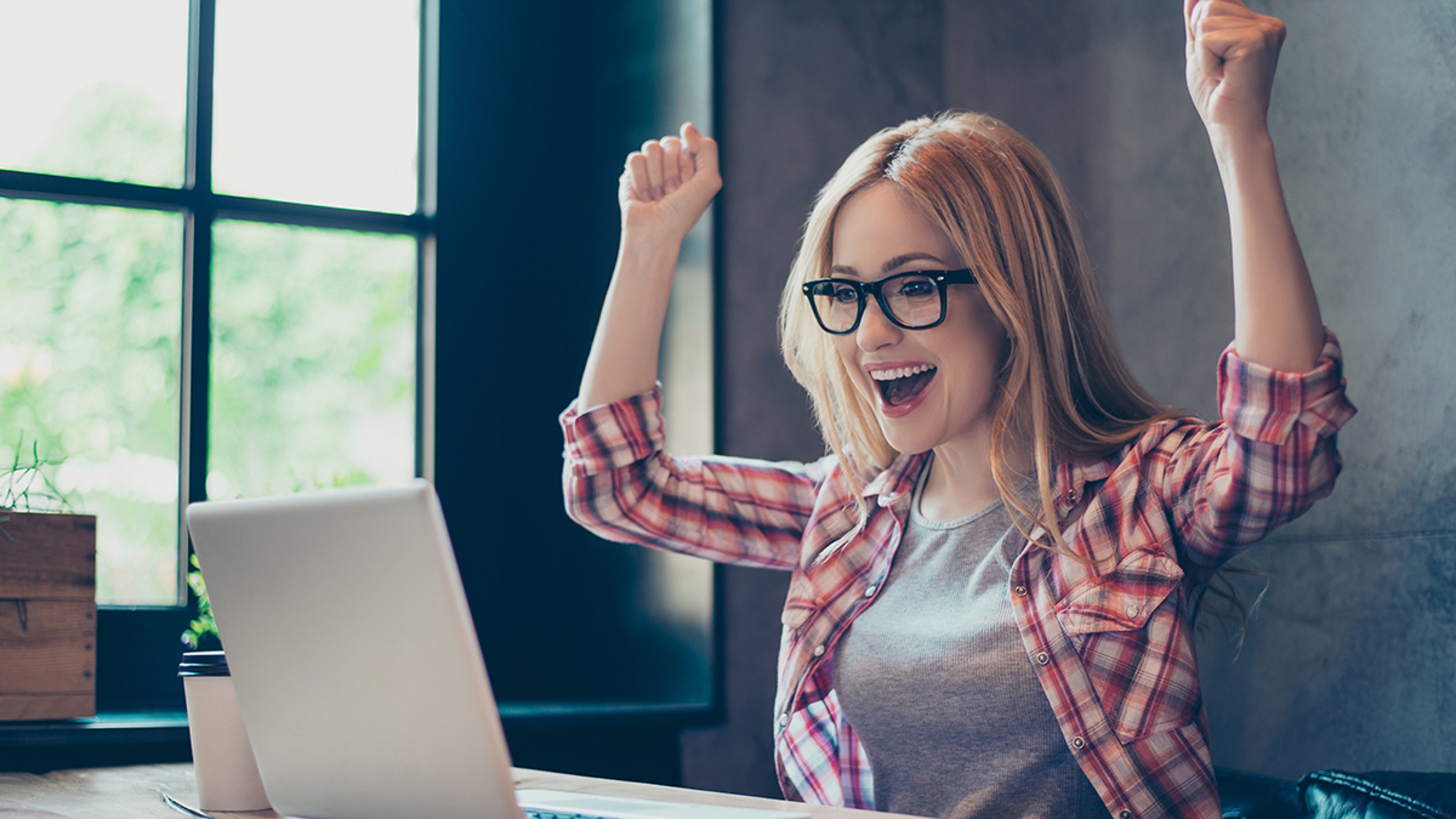 alt bashes woman celebrating in front of computer