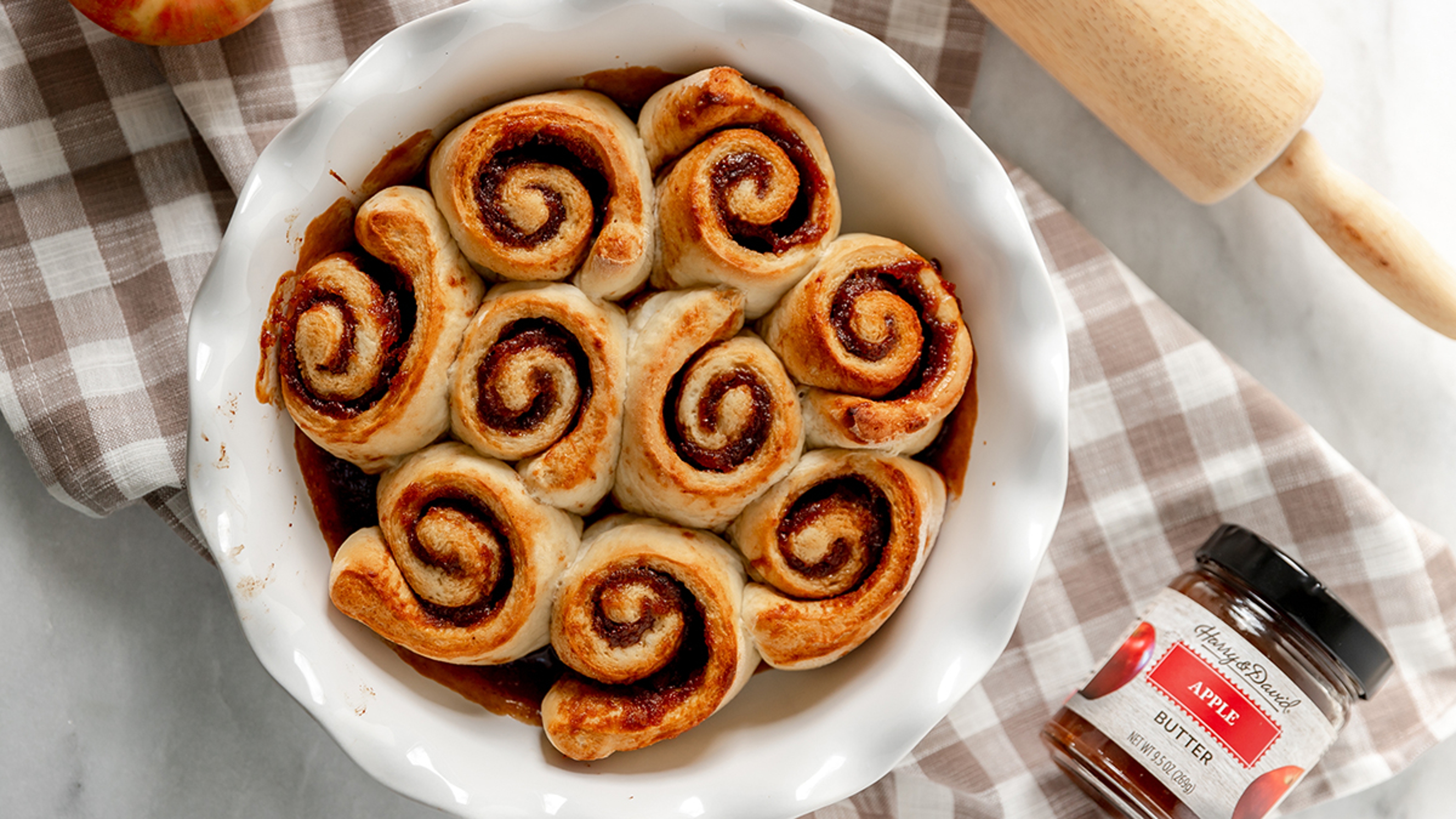 Article Cards Featured Image cinnamon rolls in a deep dish with apple butter filling recipe image