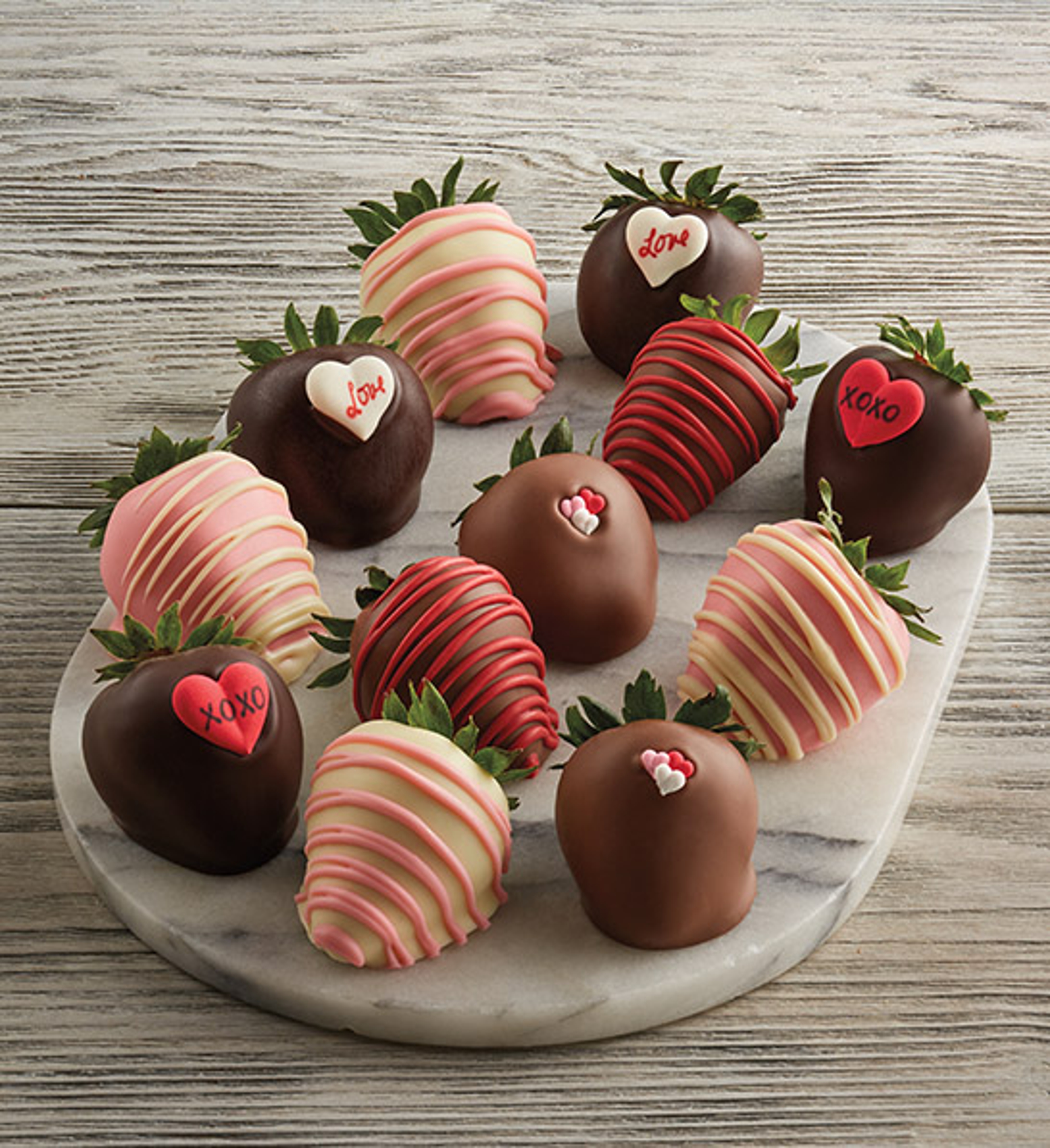 anniversary gift guide image chocolate covered strawberries displayed on board