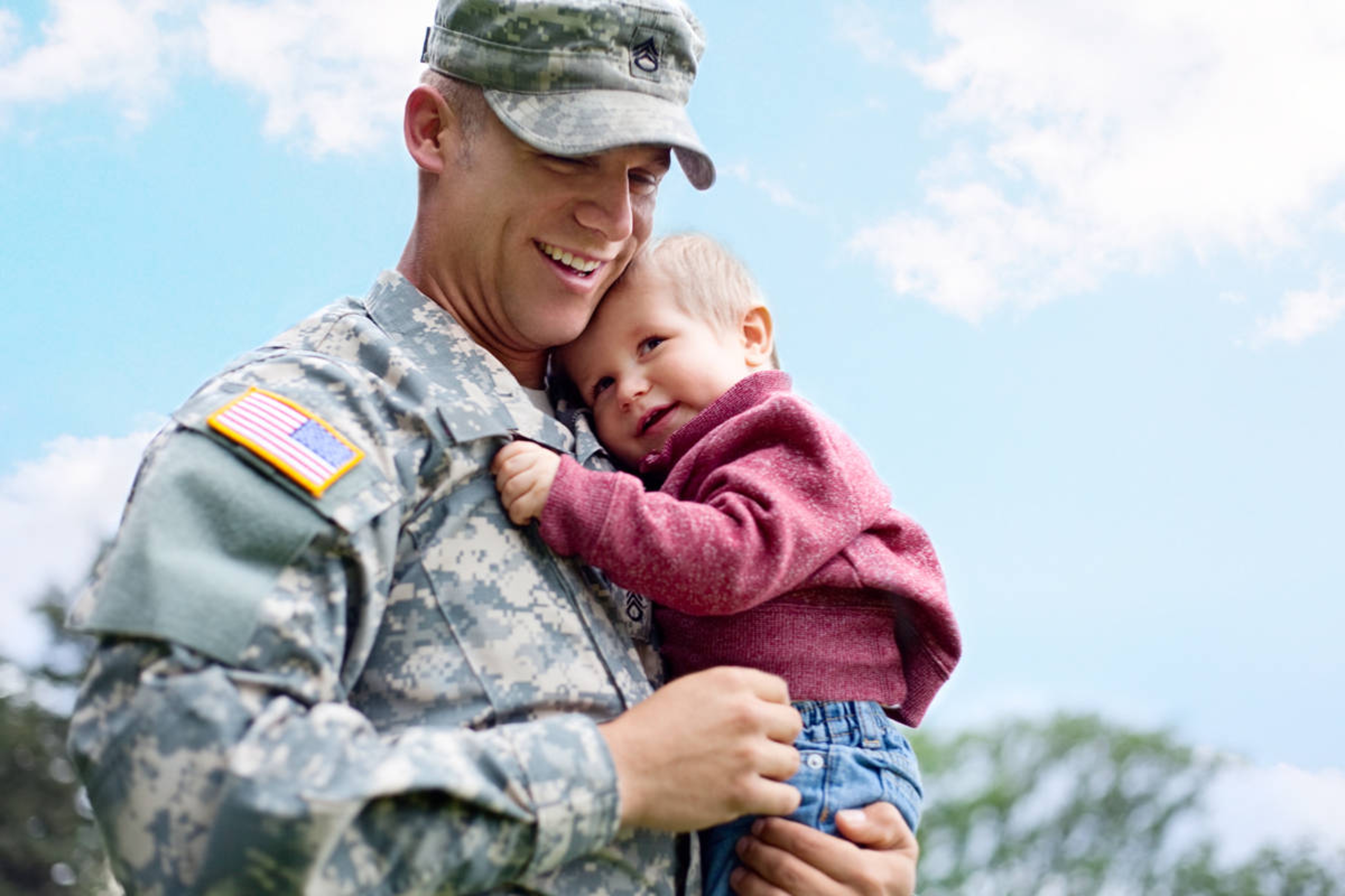 Article Cards Featured Image Military father holding son