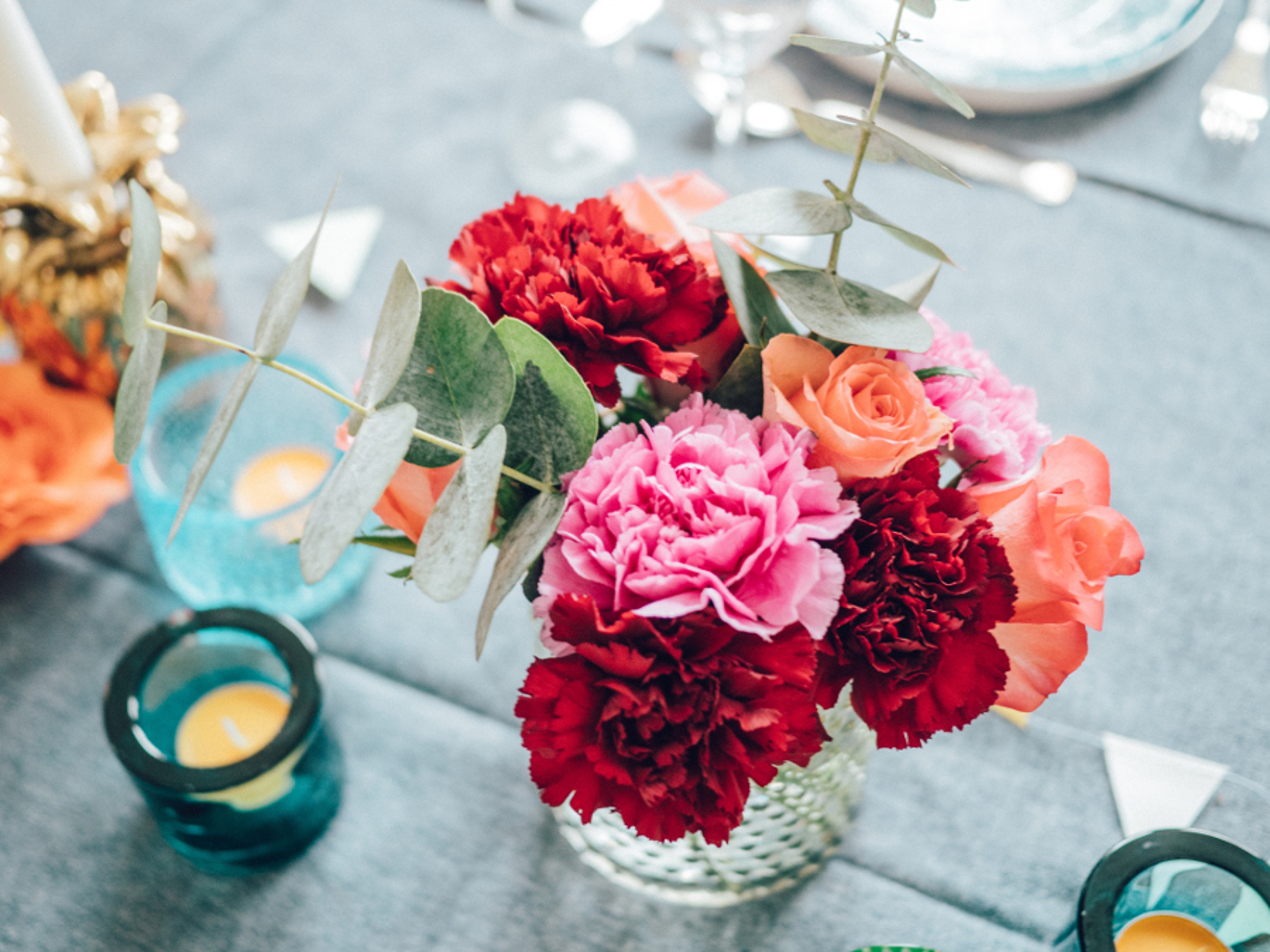 Article Cards Featured Image Carnation bouquet in glass vase on table