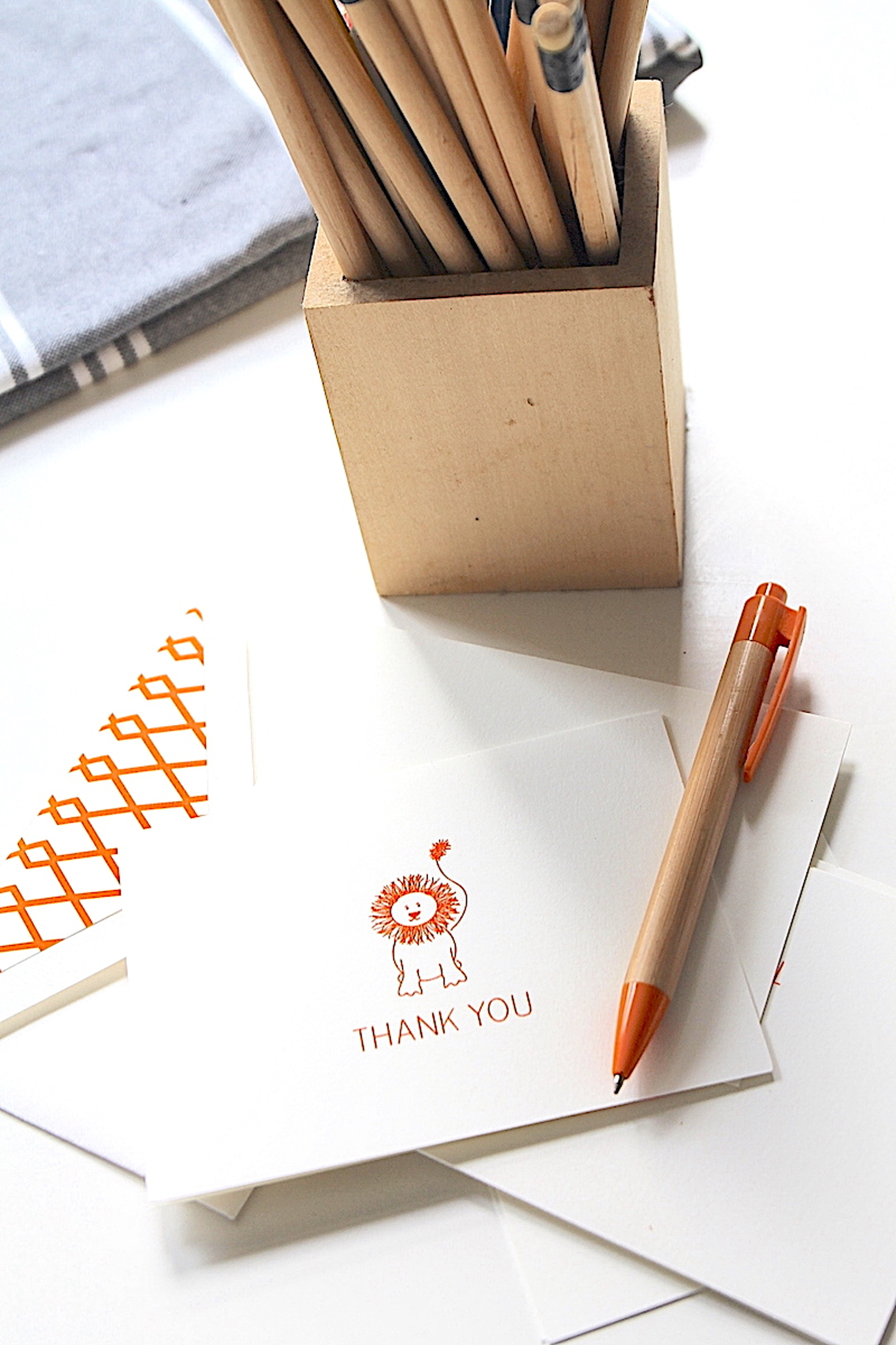 what to write in a thank you note Photo of thank you note with pens