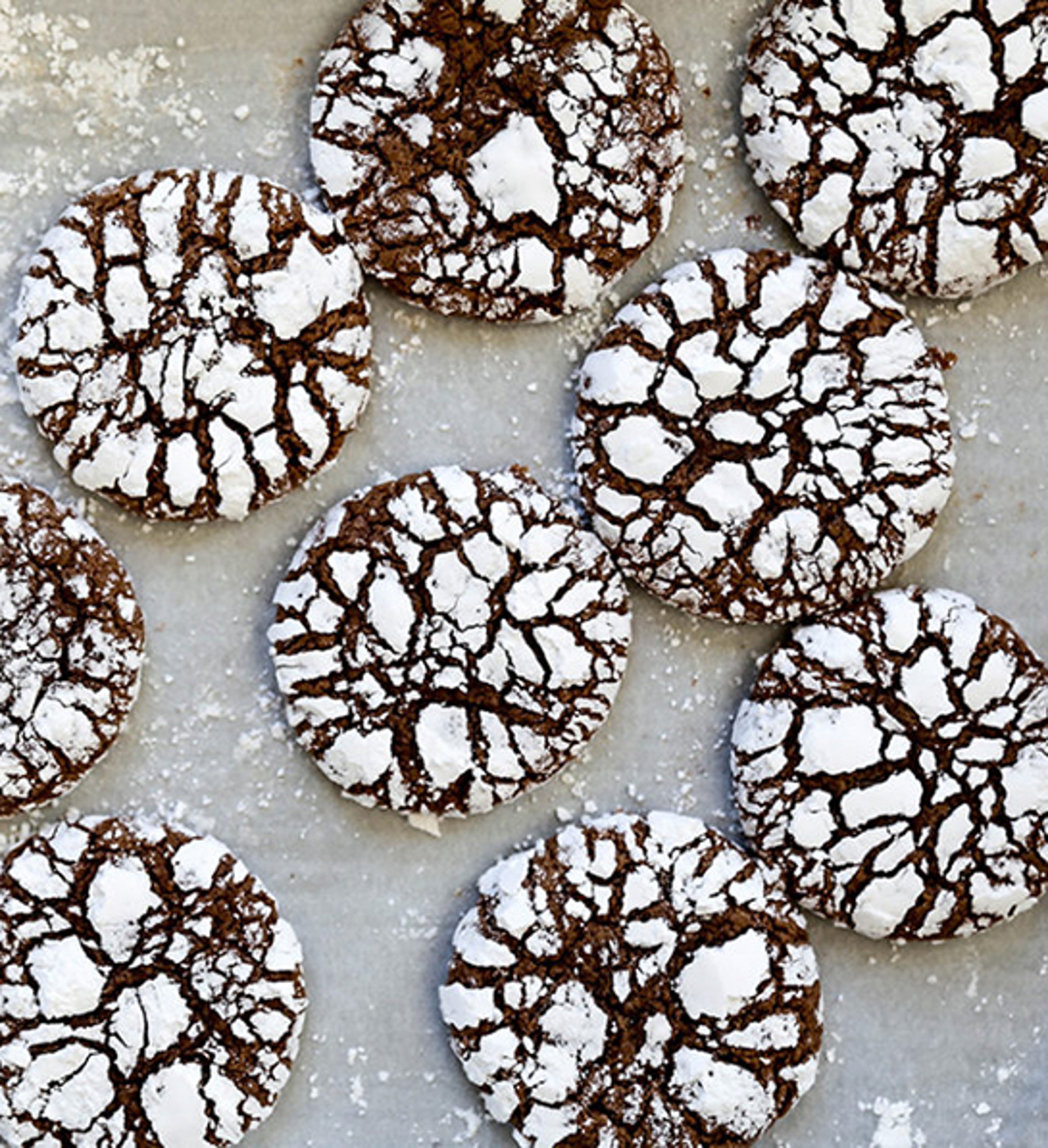 Baking sheet of chocolate crinkles.