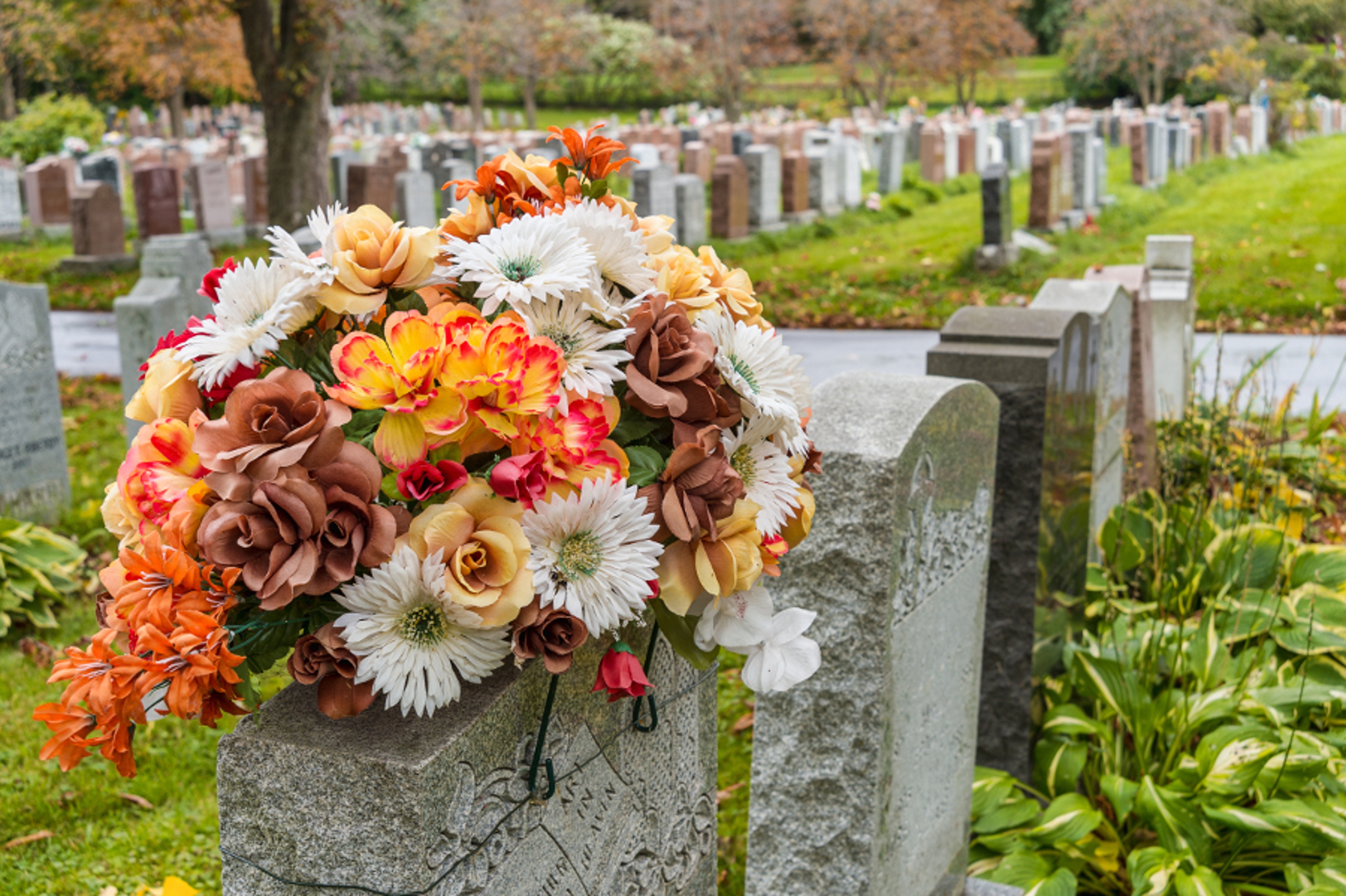 Article Cards Featured Image Flowers on tombstone