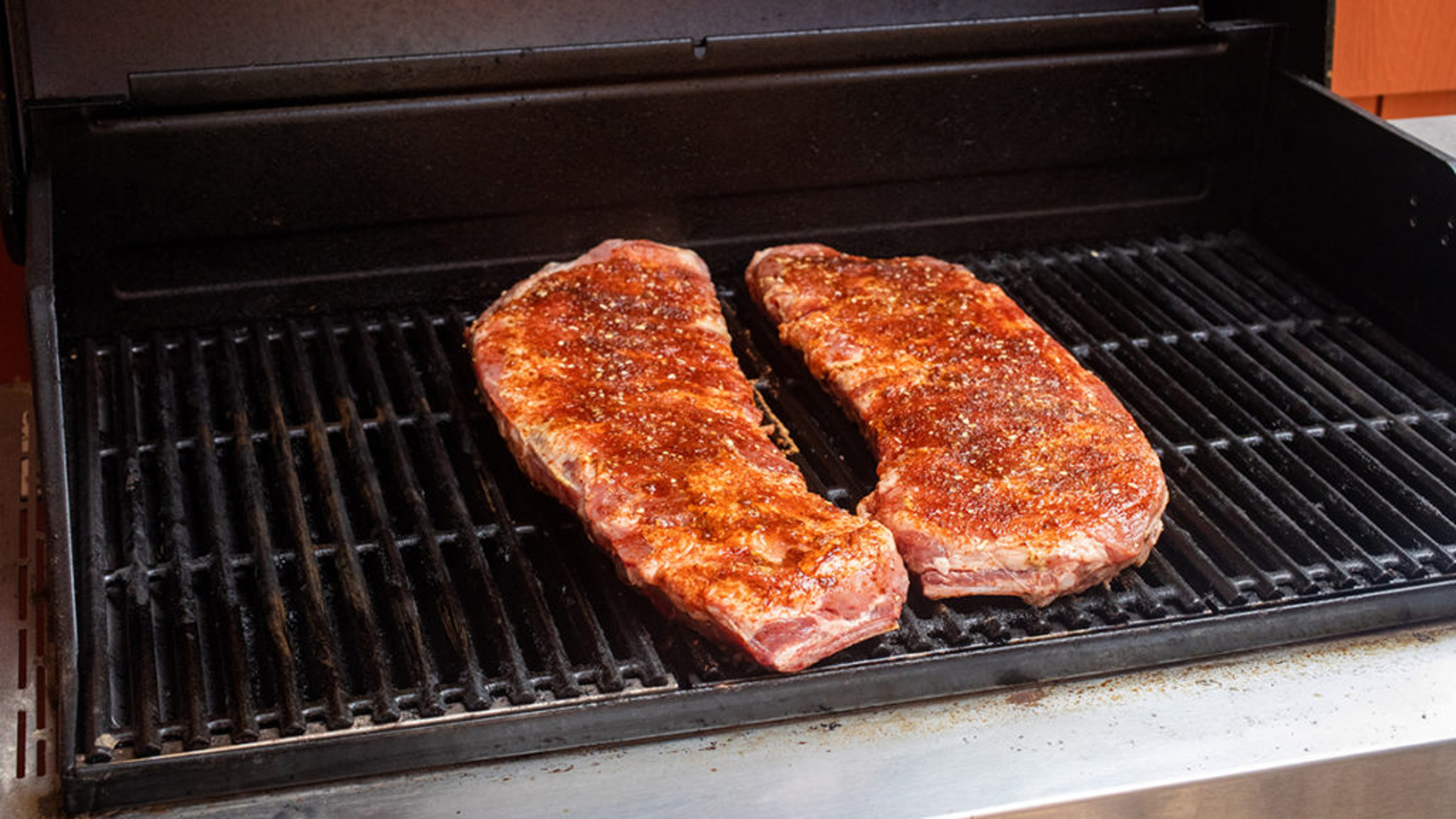 How to grill ribs on an outdoor grill.