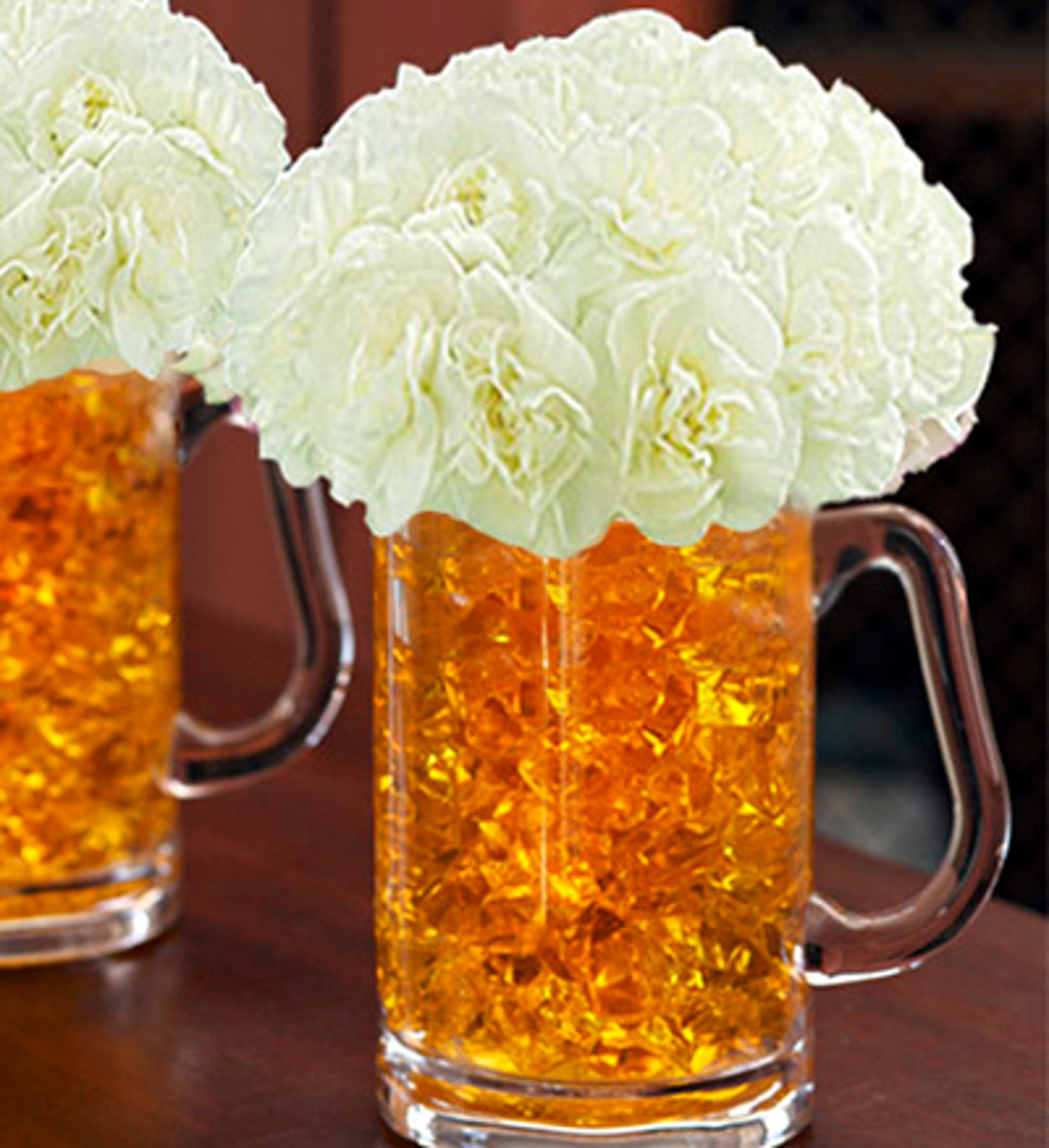 Beer mug with jewels and flowers.