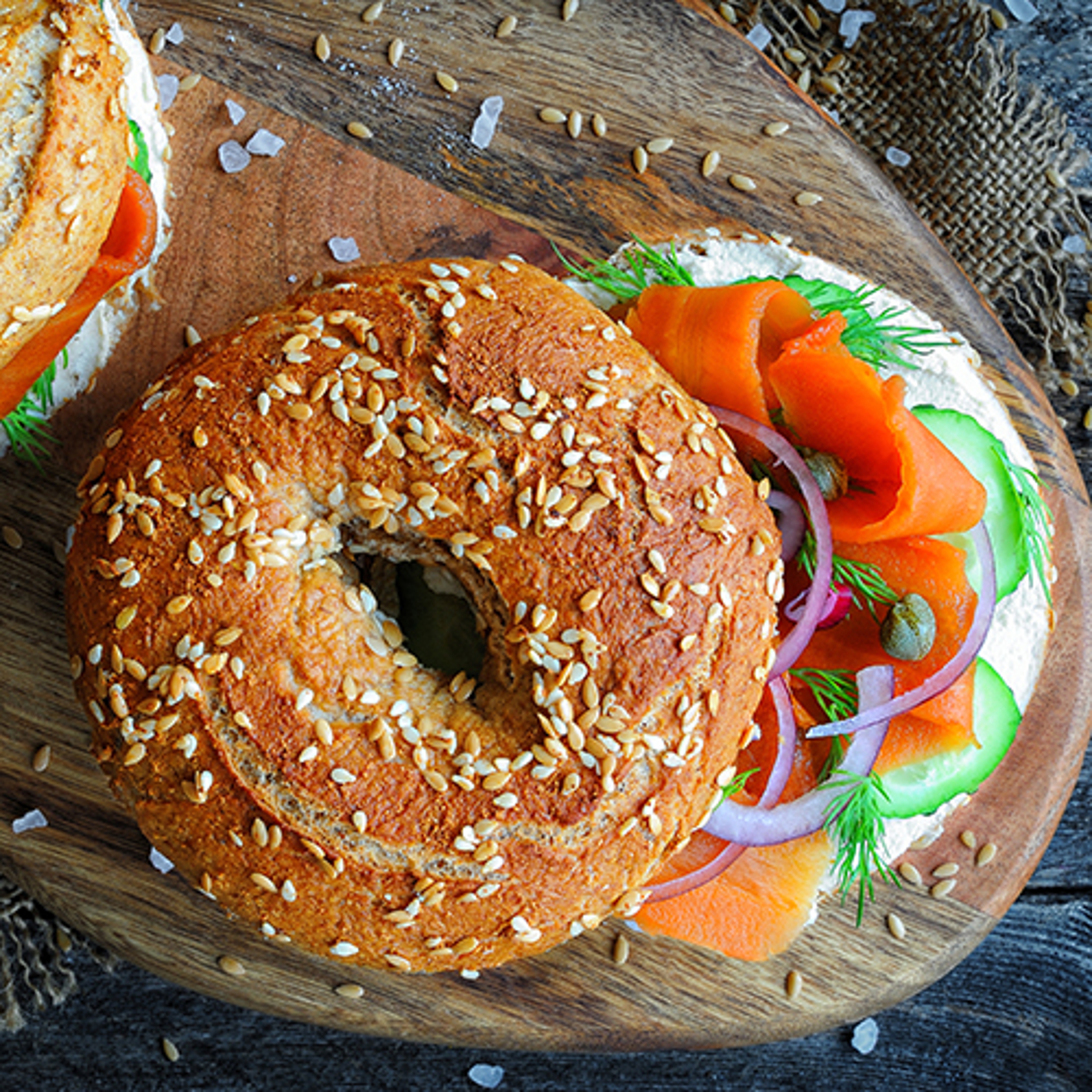 Carrot recipes with carrot lox on a bagel with cream cheese and cucumbers.