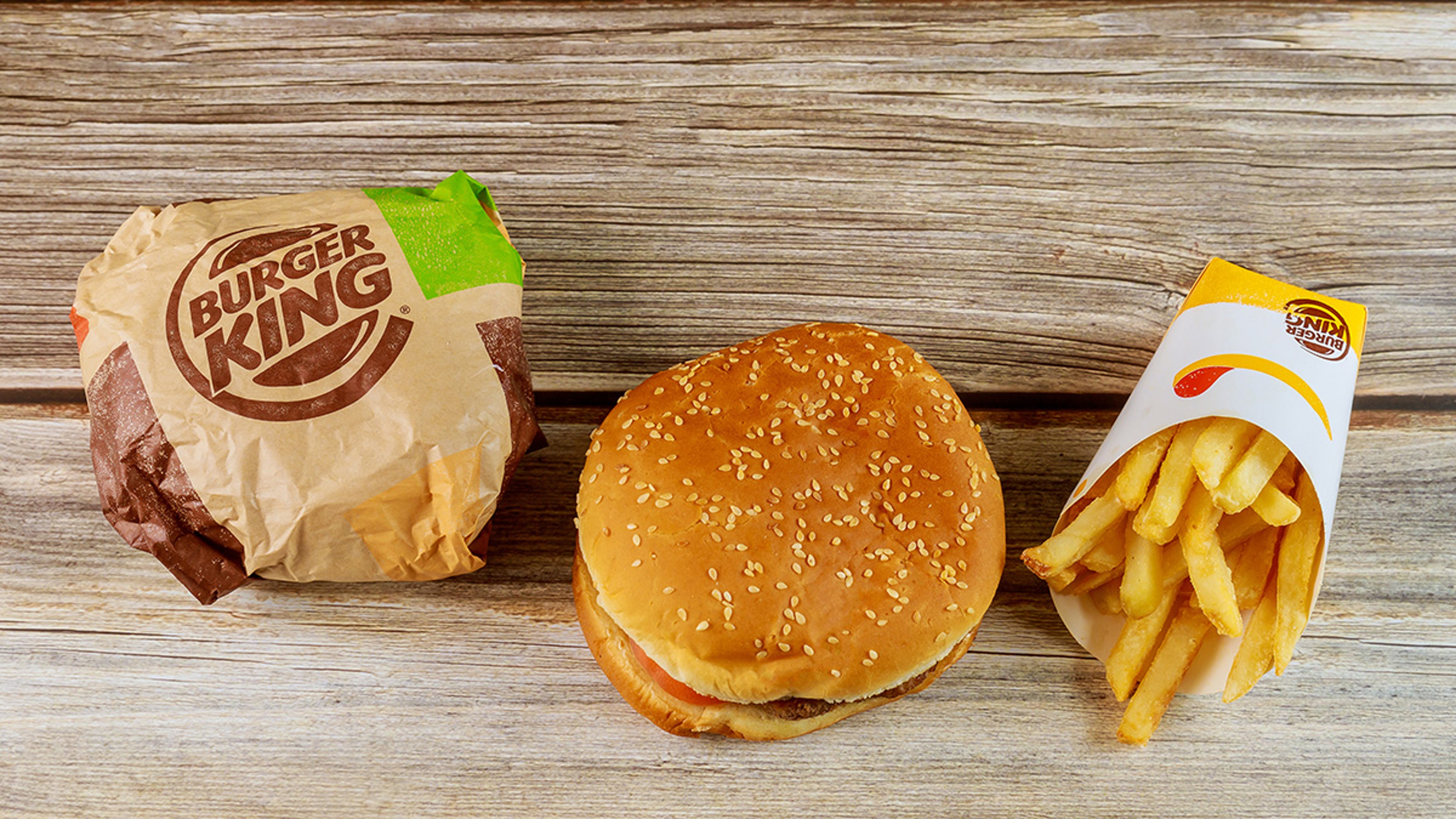 January Chicago IL: Burger king set has hamburger french fries on wooden table