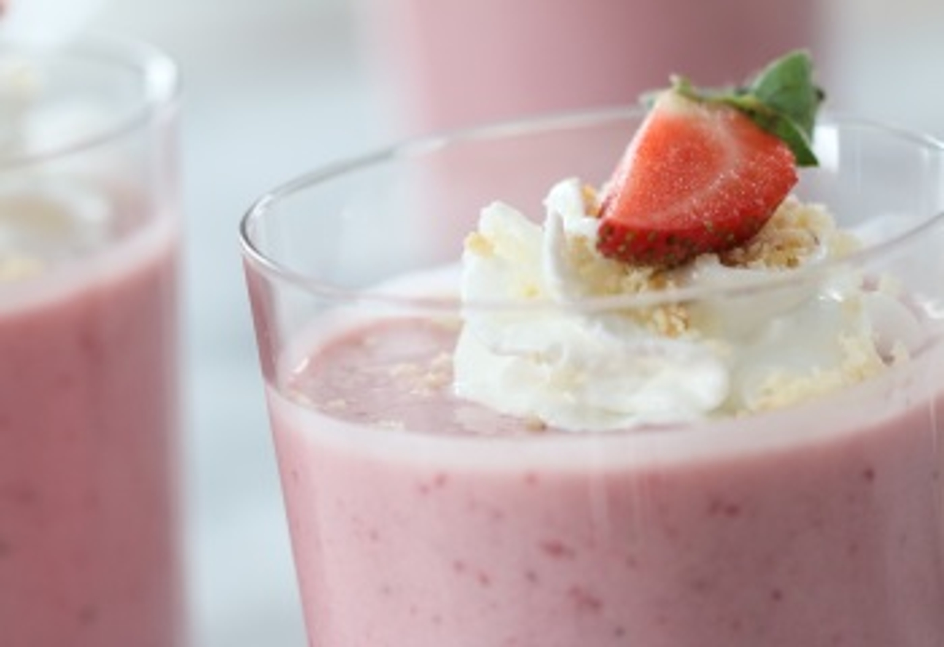 Article Cards Featured Image strawberry shortcake smoothies close up with whipped cream thumb e