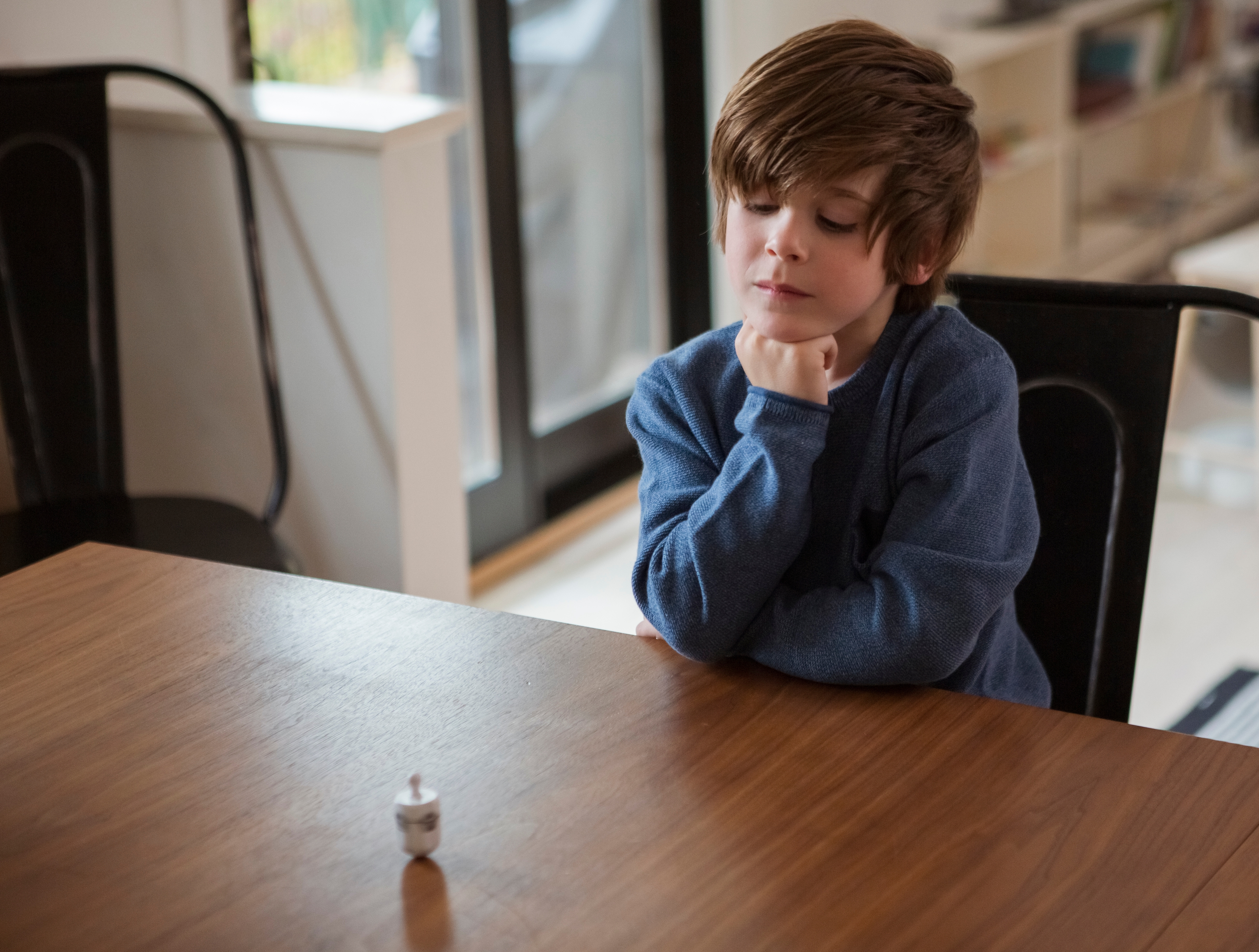 when is hanukkah boy spinning dreidel