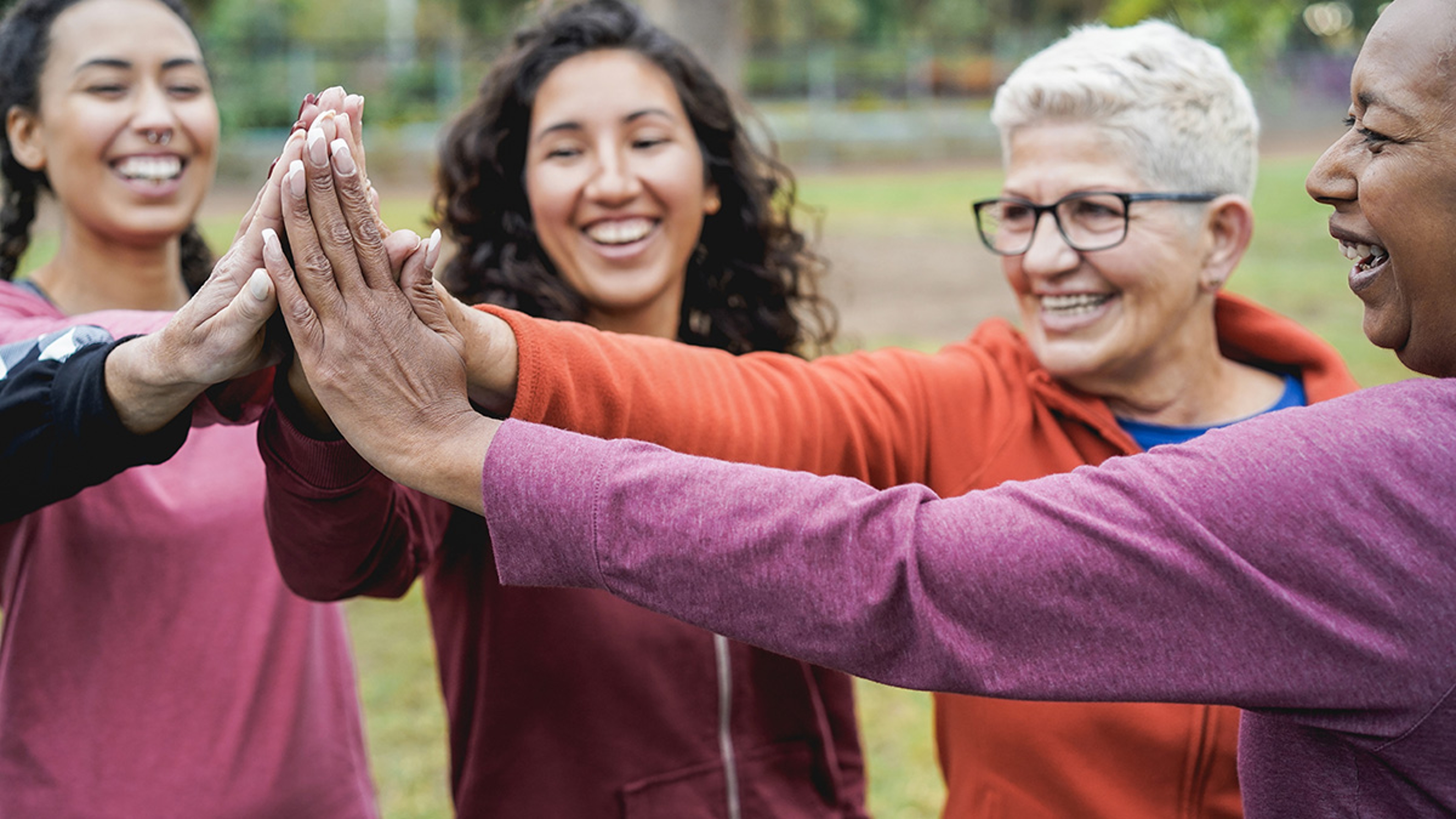 Article Cards Featured Image women high fiving one another