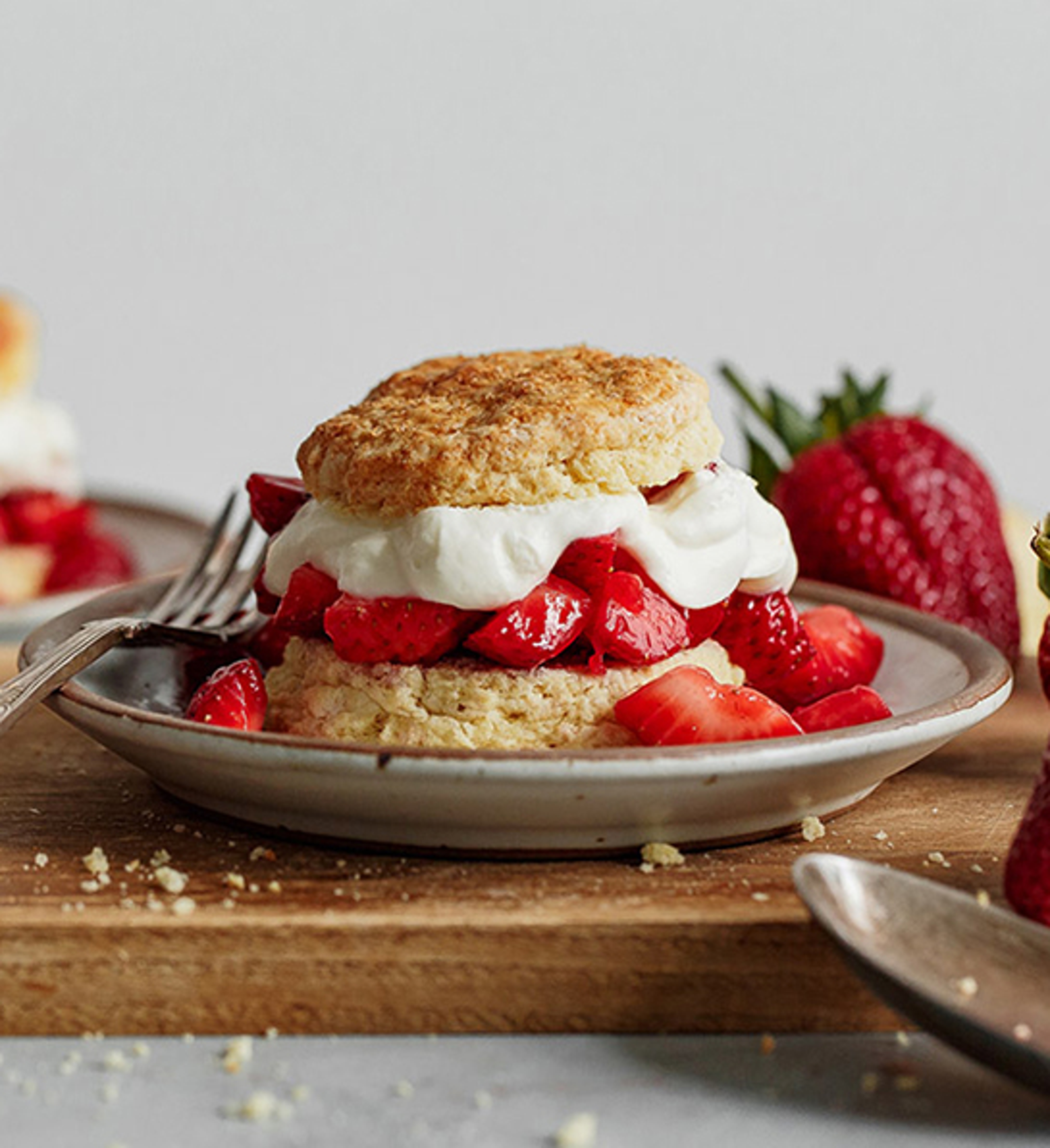 Plate of strawberry shortcakes and cream