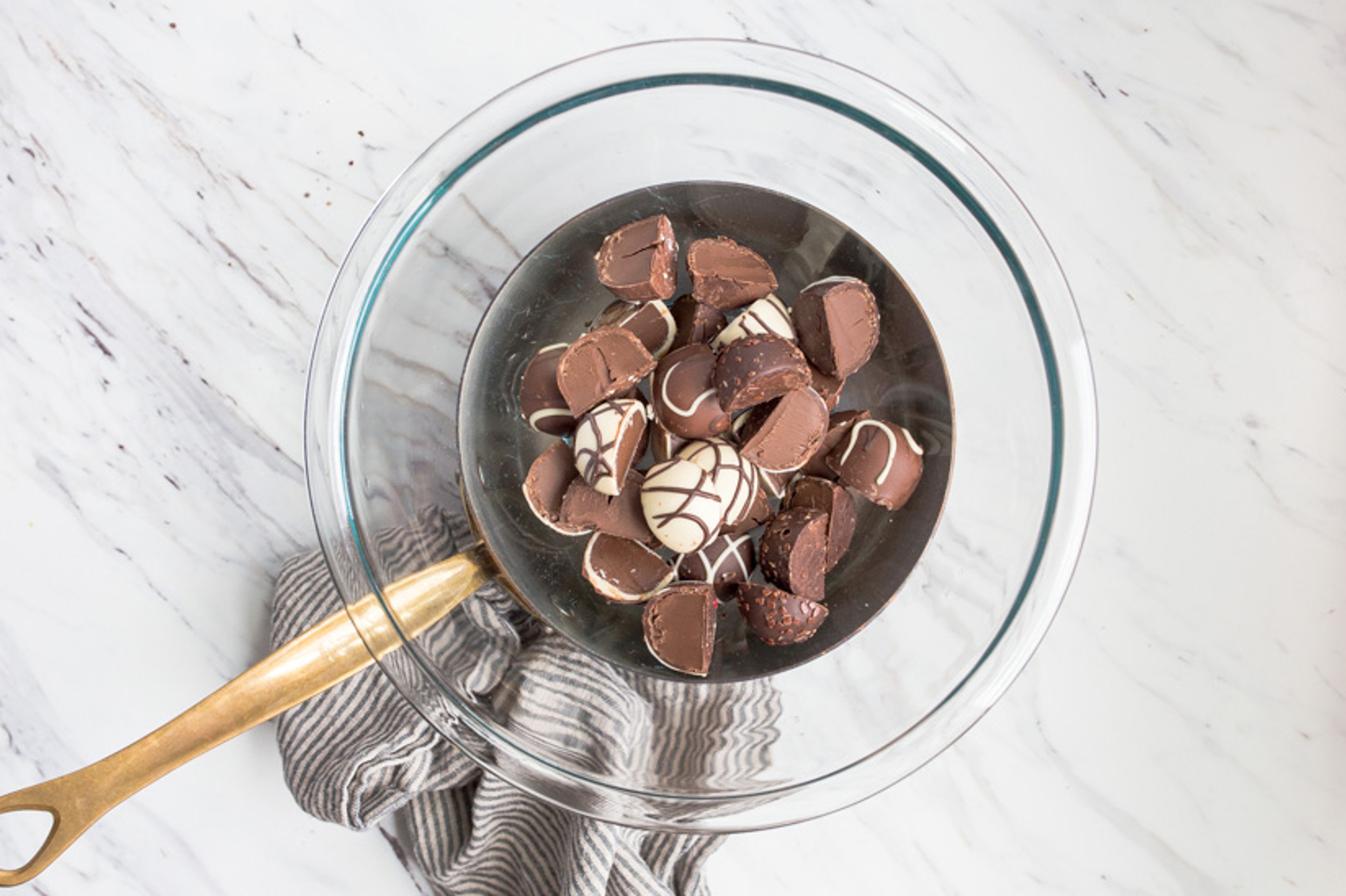 How to make chocolate covered strawberries with truffles in a double boiler.