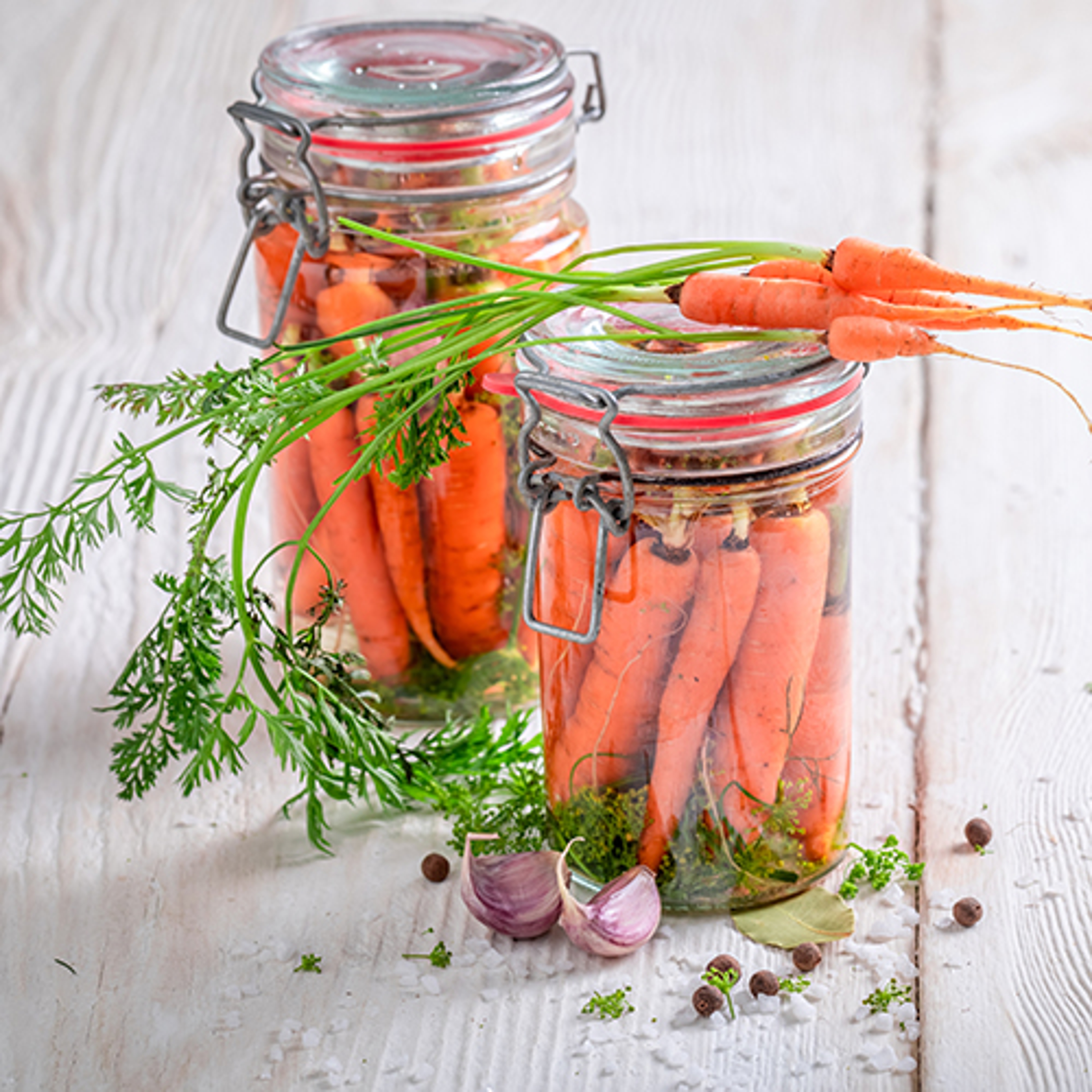 Pickled carrots in jars.