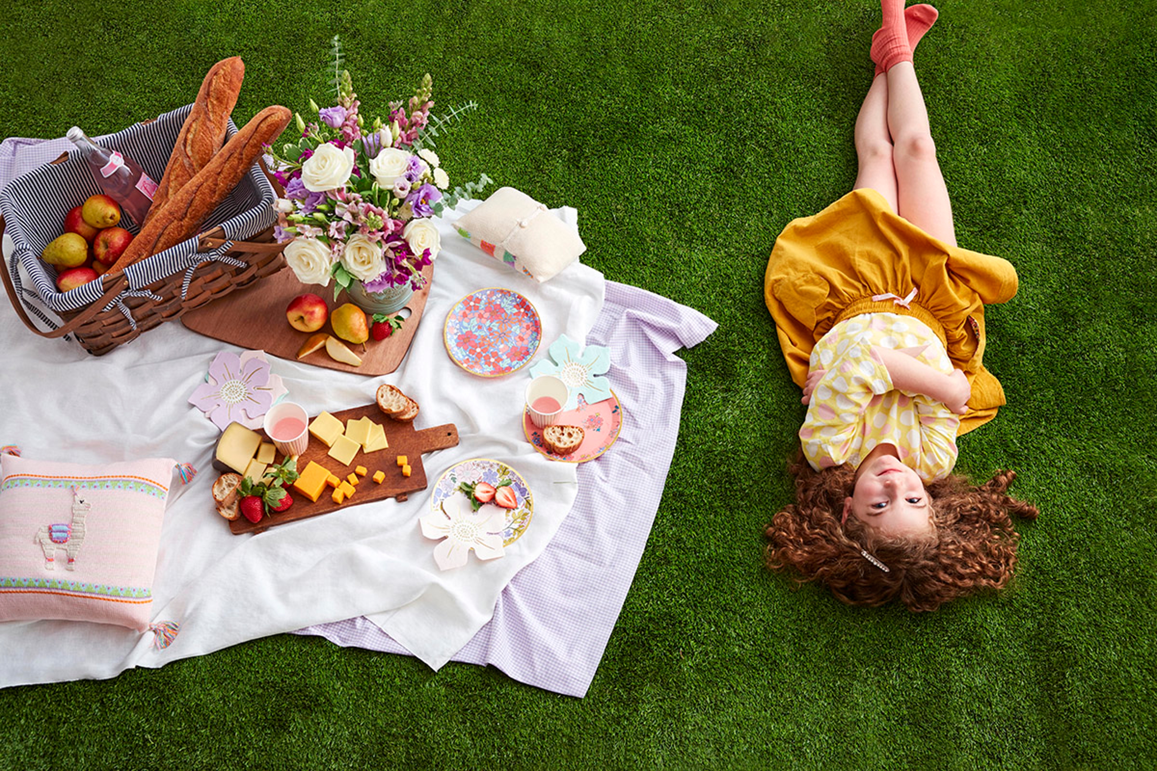 spring facts girl lying on back picnicking