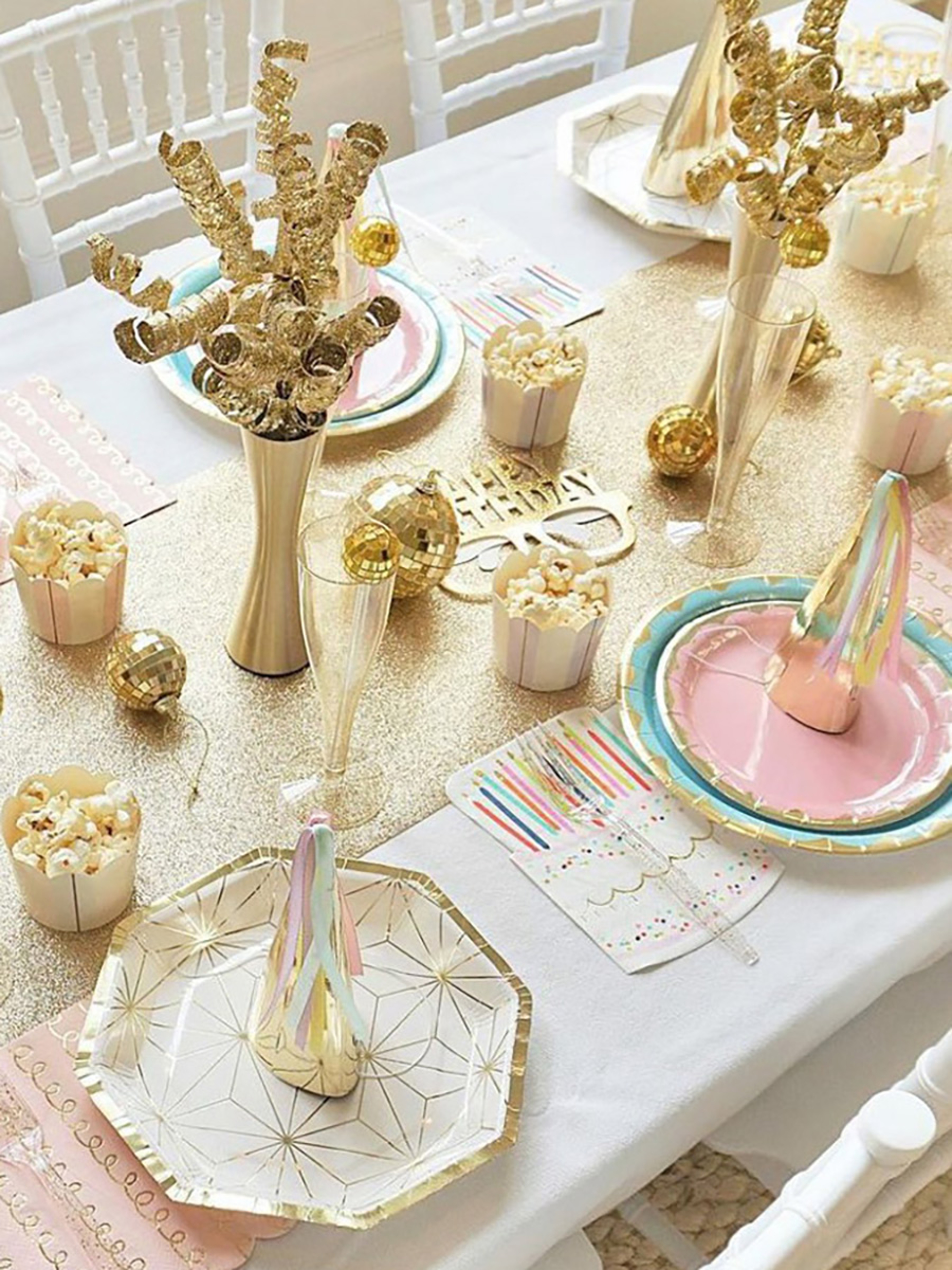 Table decorated for a golden birthday.