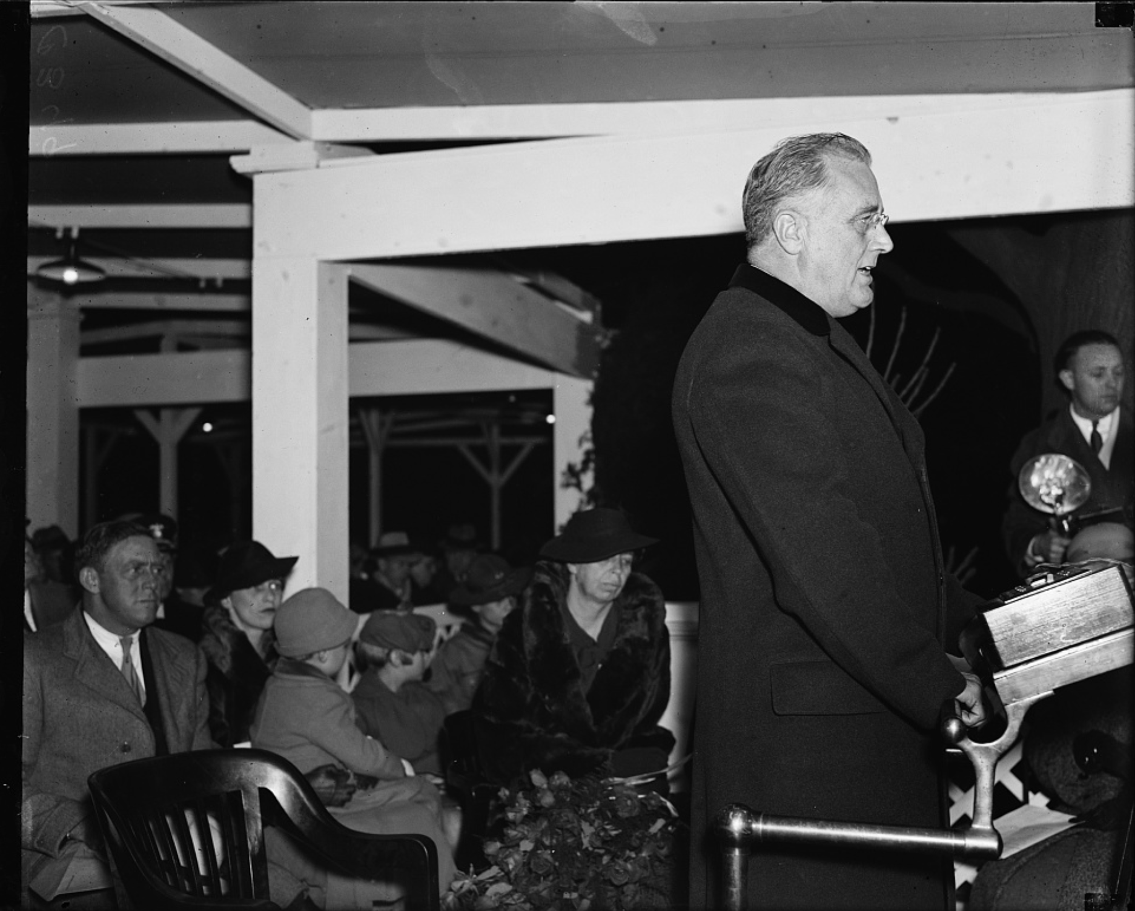 Christmas in with President FDR giving a speech.