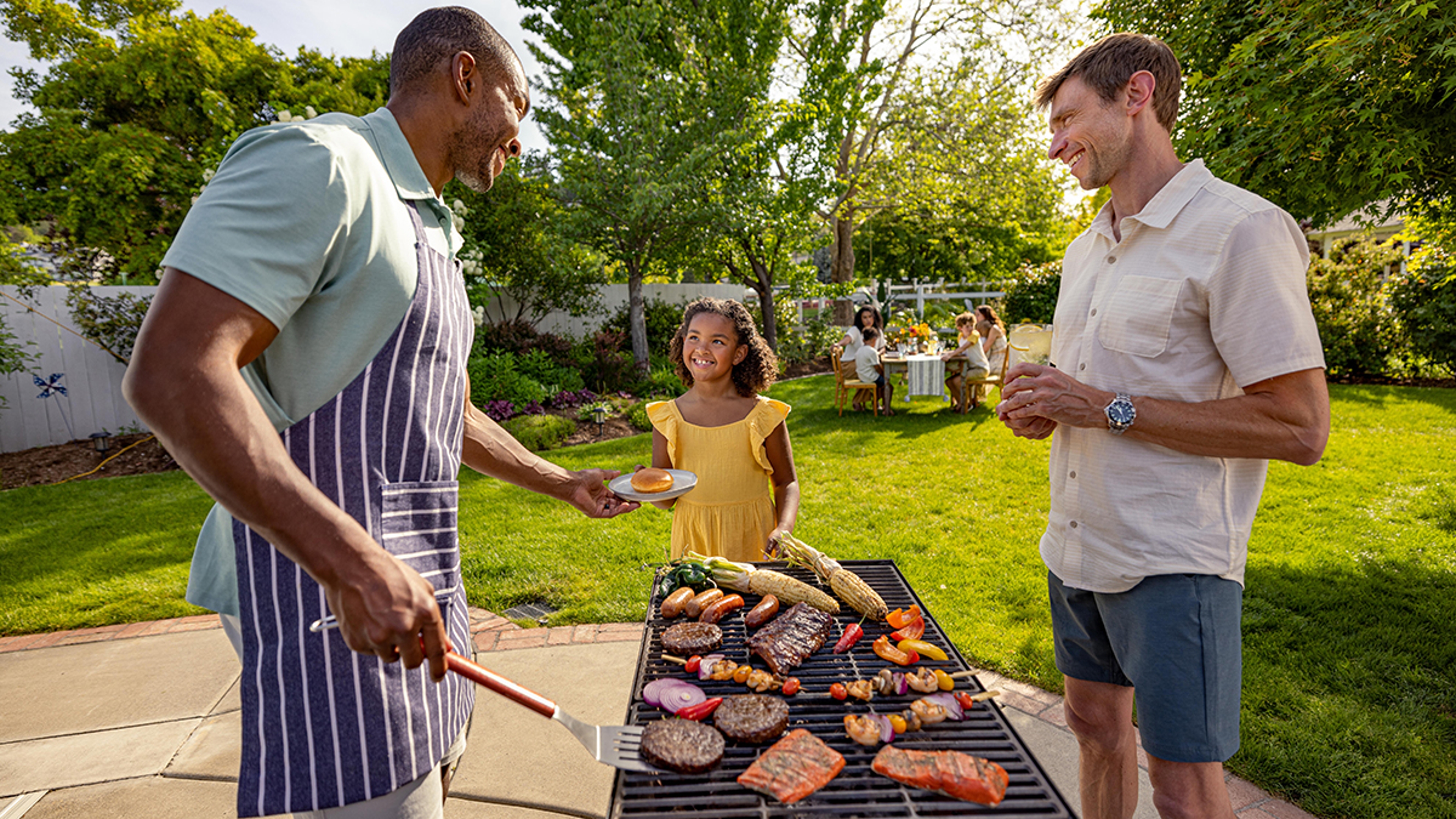 Article Cards Featured Image how to grill young girl with men around grill