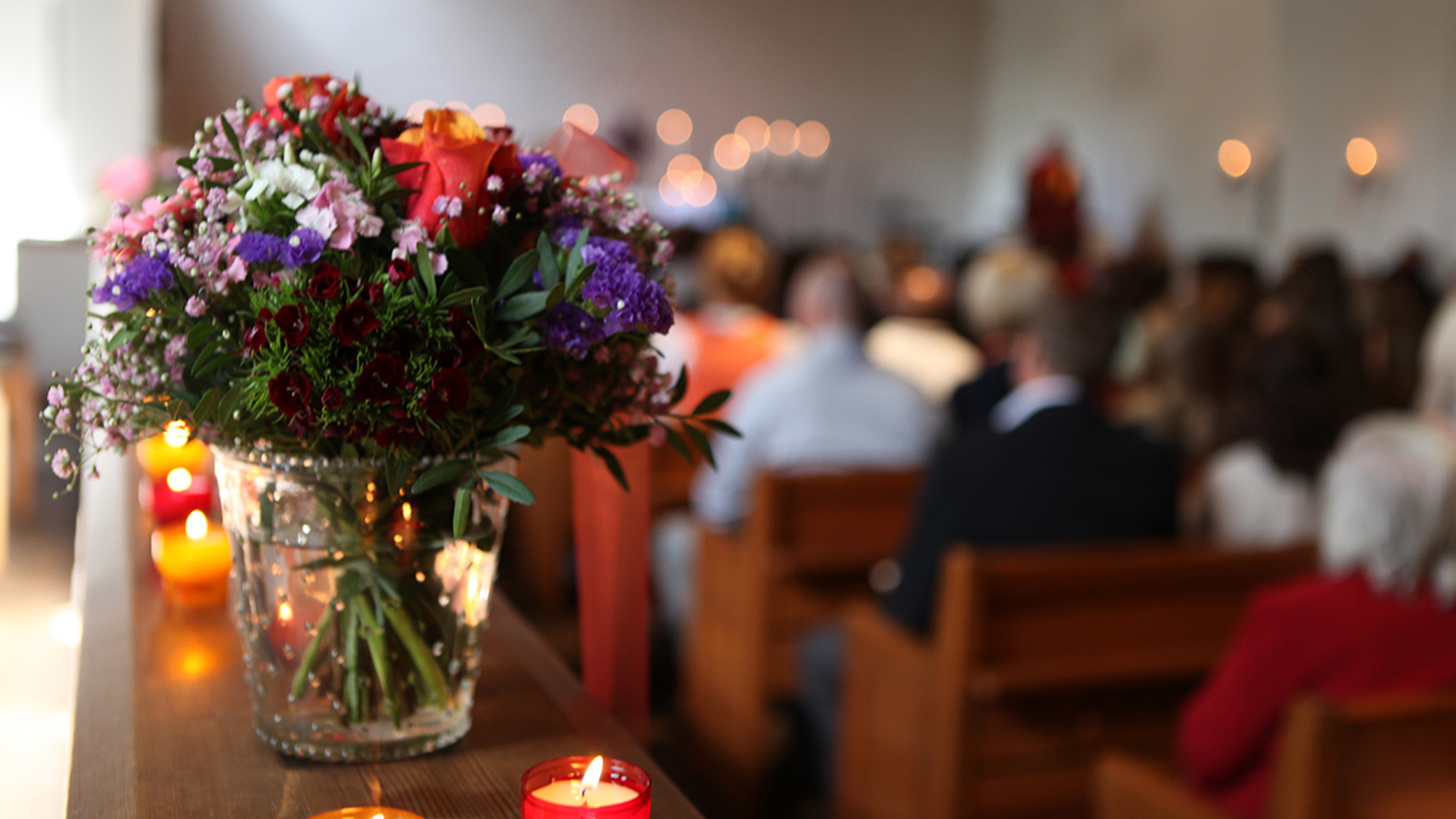 Article Cards Featured Image Flowers at a funeral service