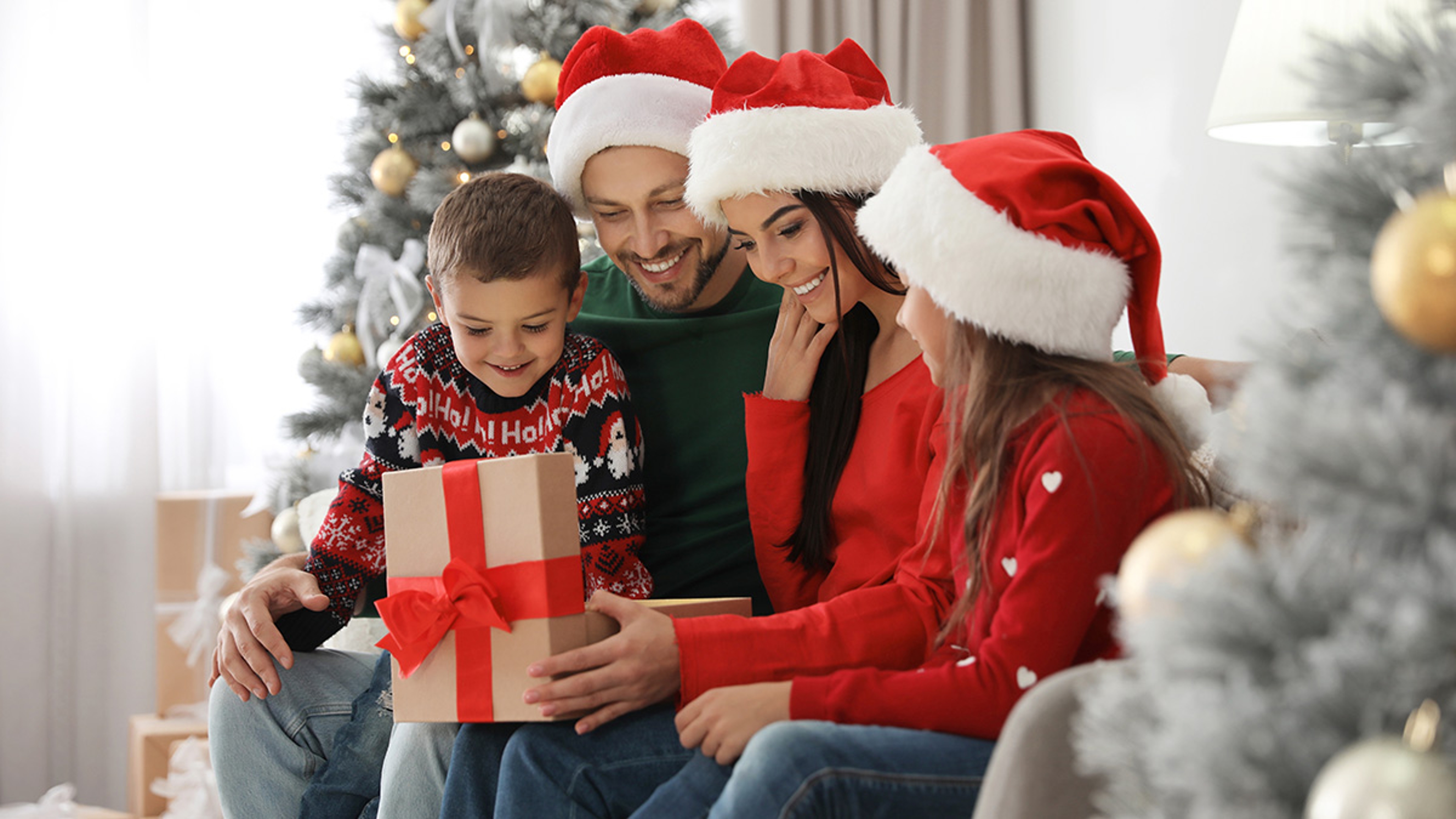 Article Cards Featured Image family opening up Christmas gifts