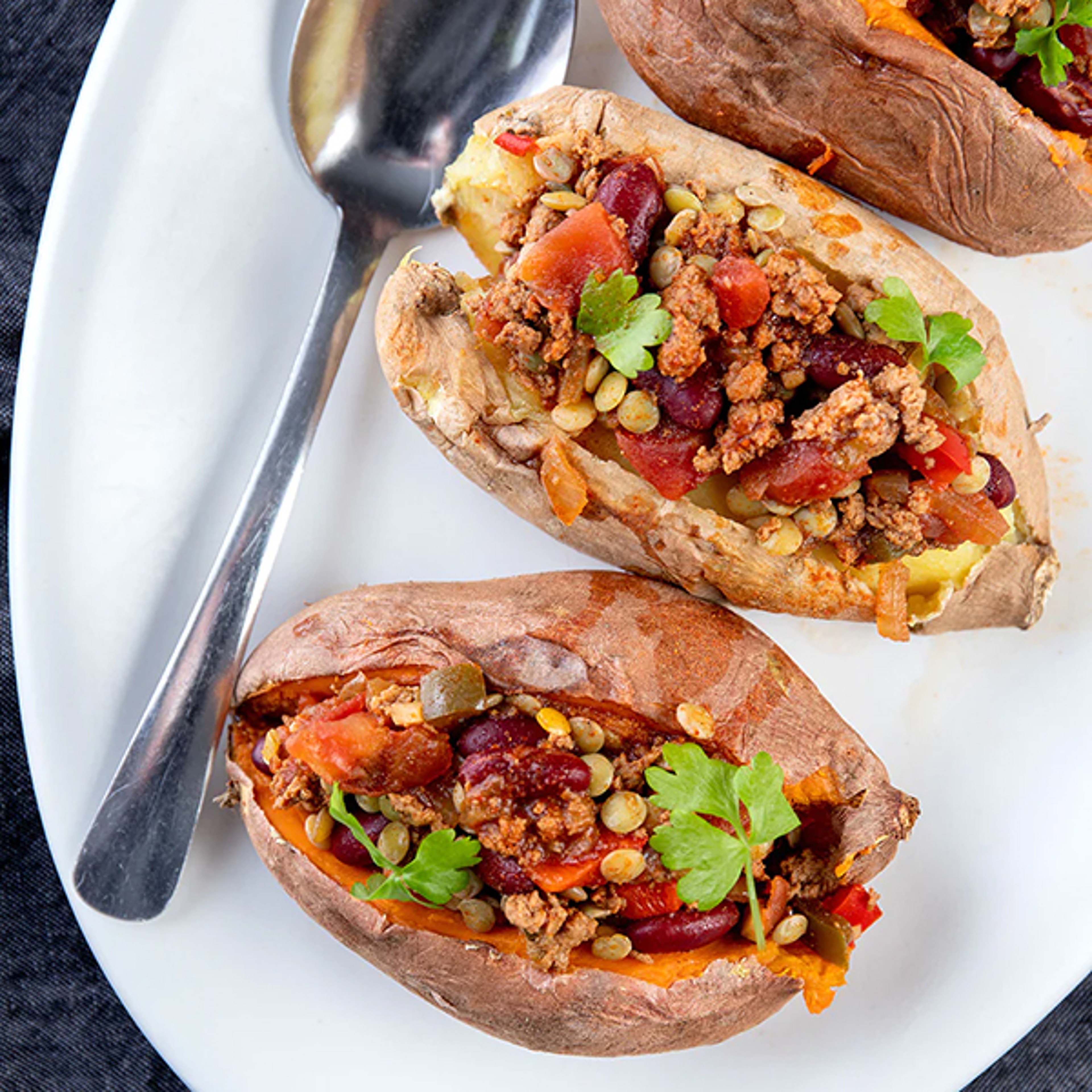 Baked potatoes stuffed with chili.