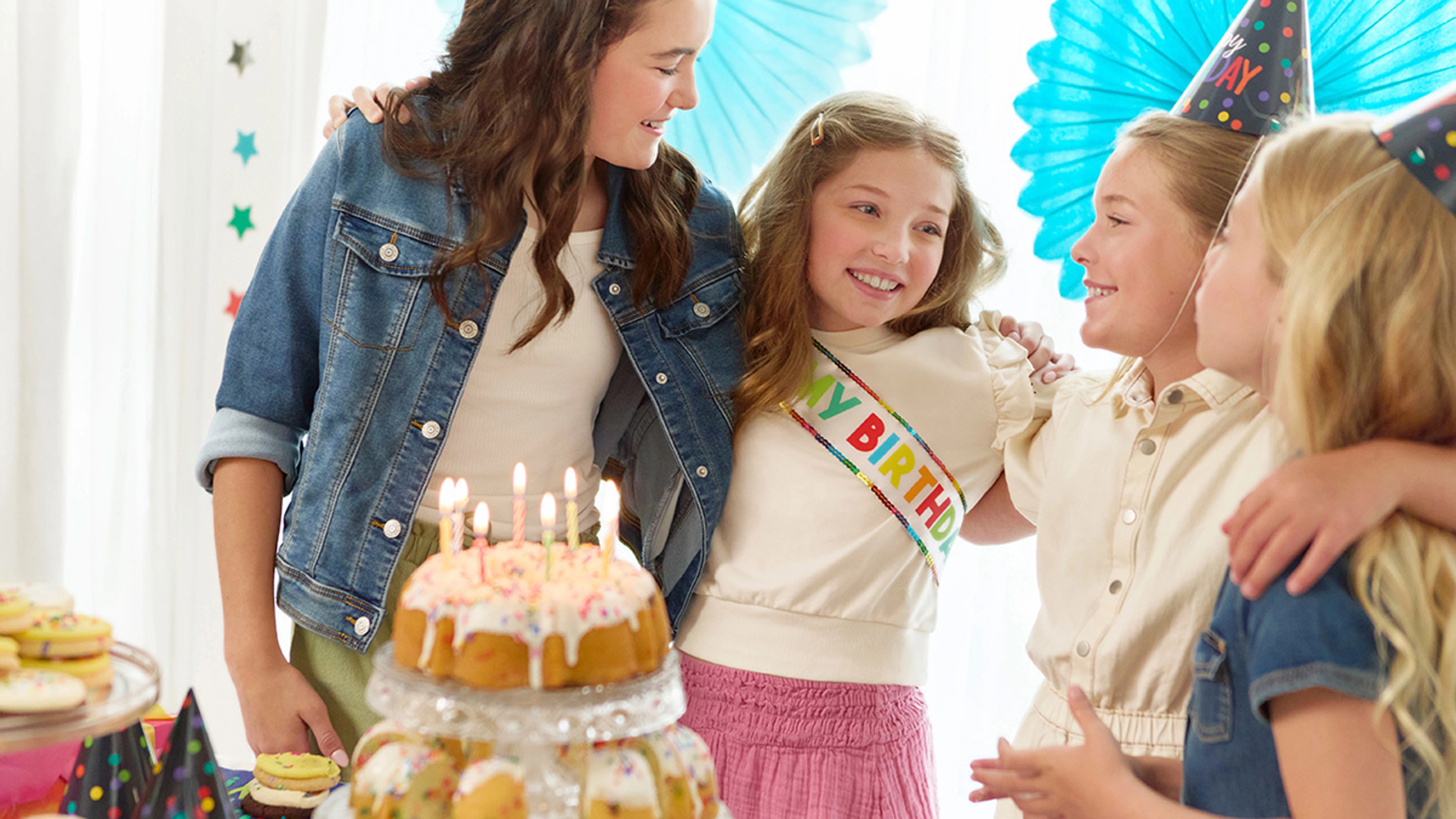 Group of young girls celebrating summer birthdays.