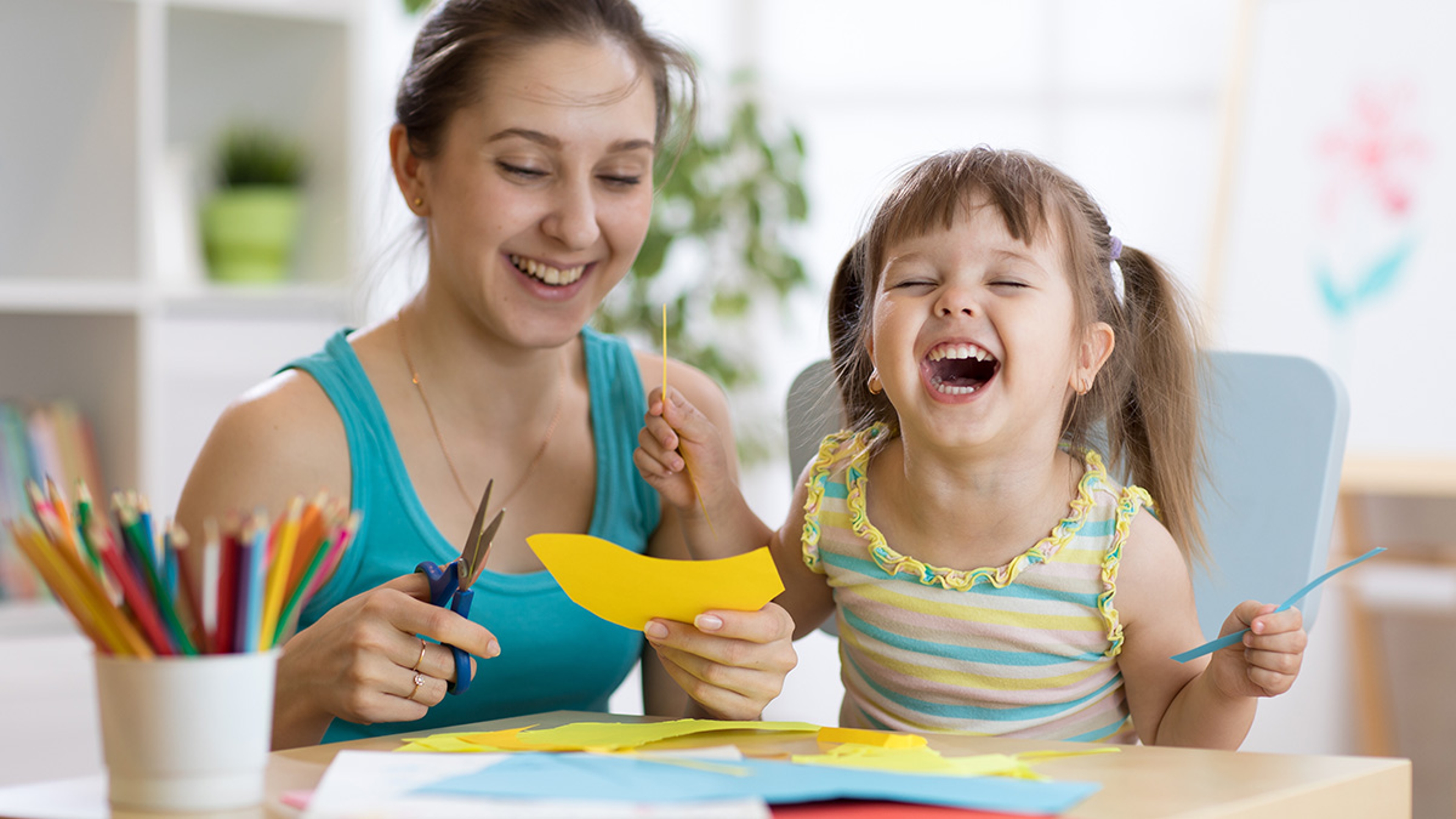 Article Cards Featured Image mother with little daughter fun cut scissors colored paper