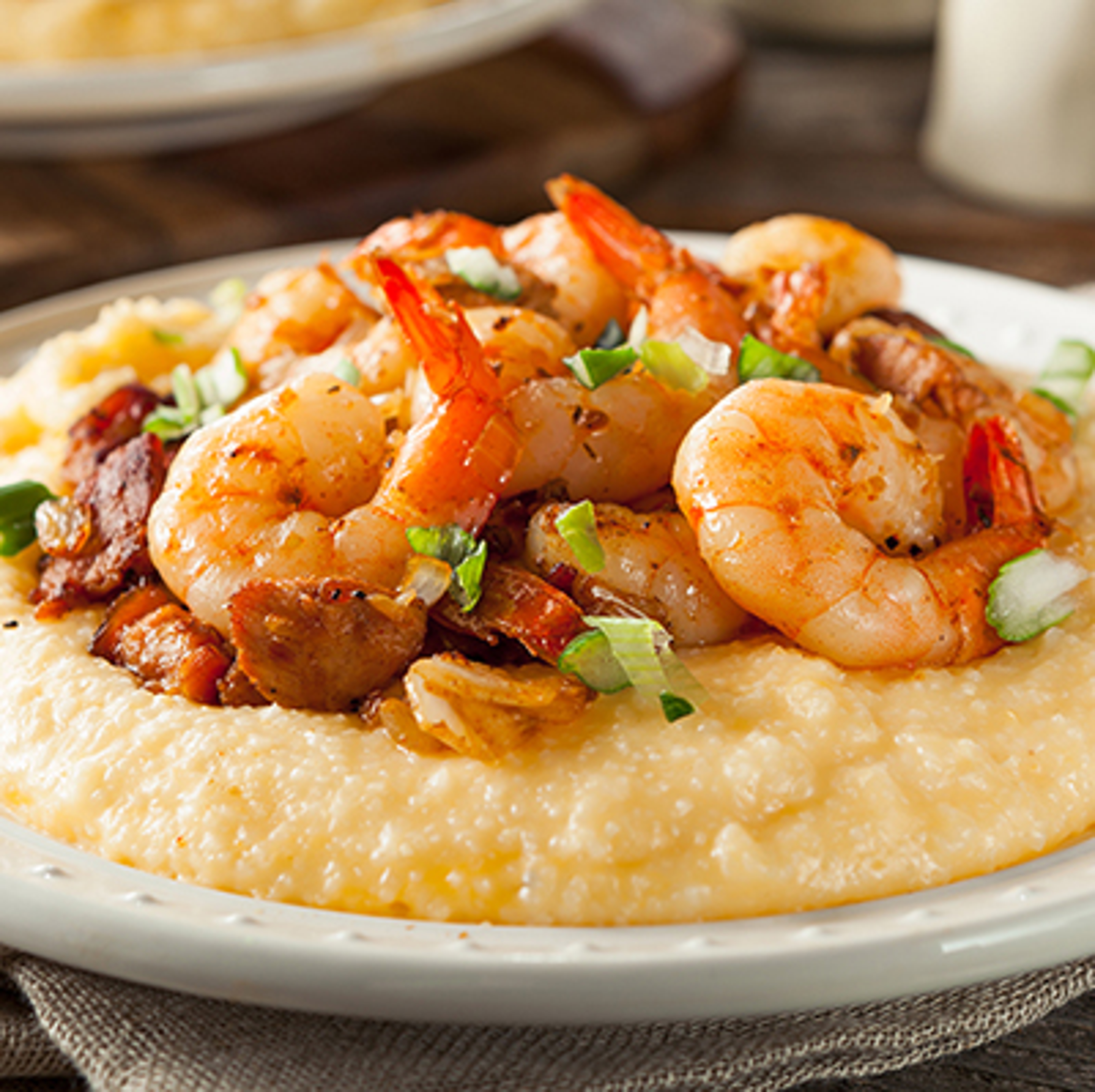 Shrimp and grits in a bowl.