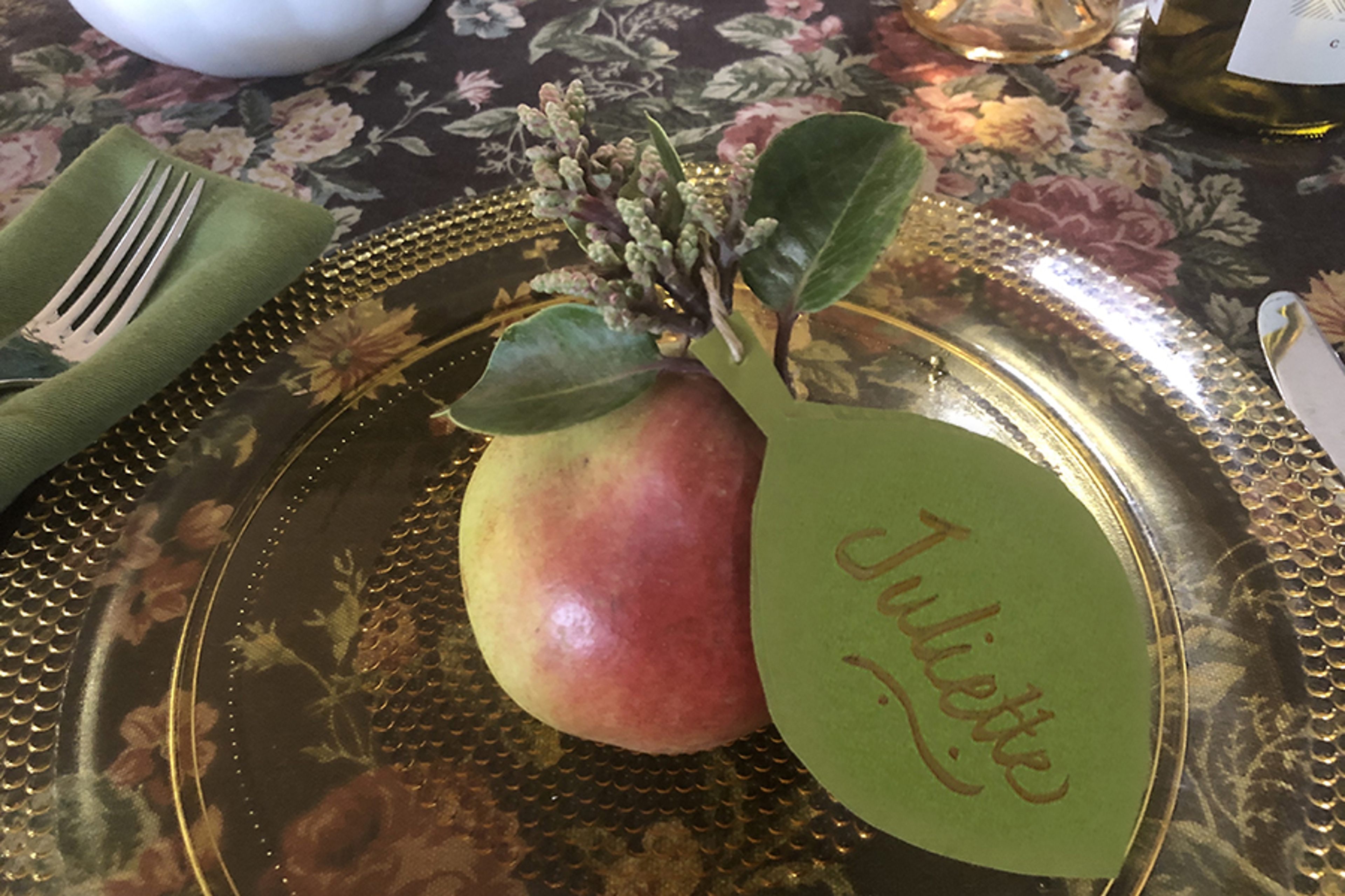 paper autumn leaf place setting with a pear