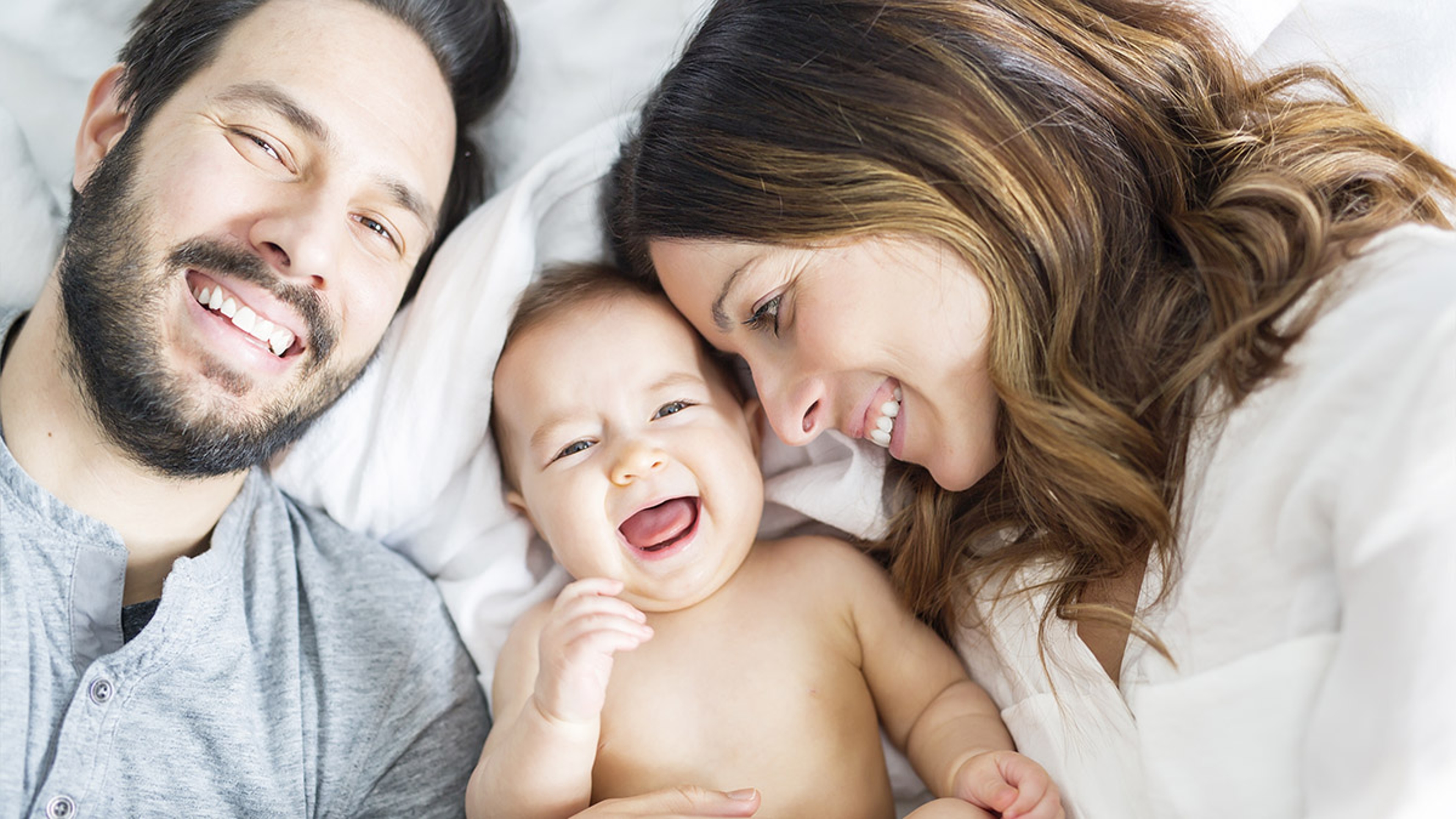 Article Cards Featured Image parents with baby