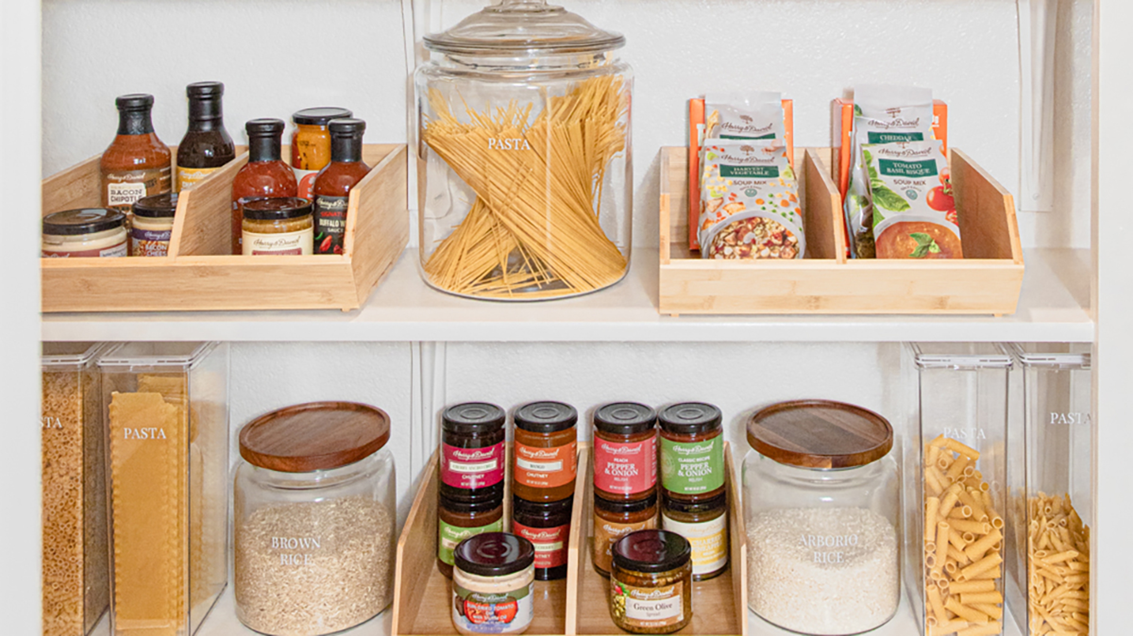 Photo of how to stock a pantry with canned and pre packaged food items.