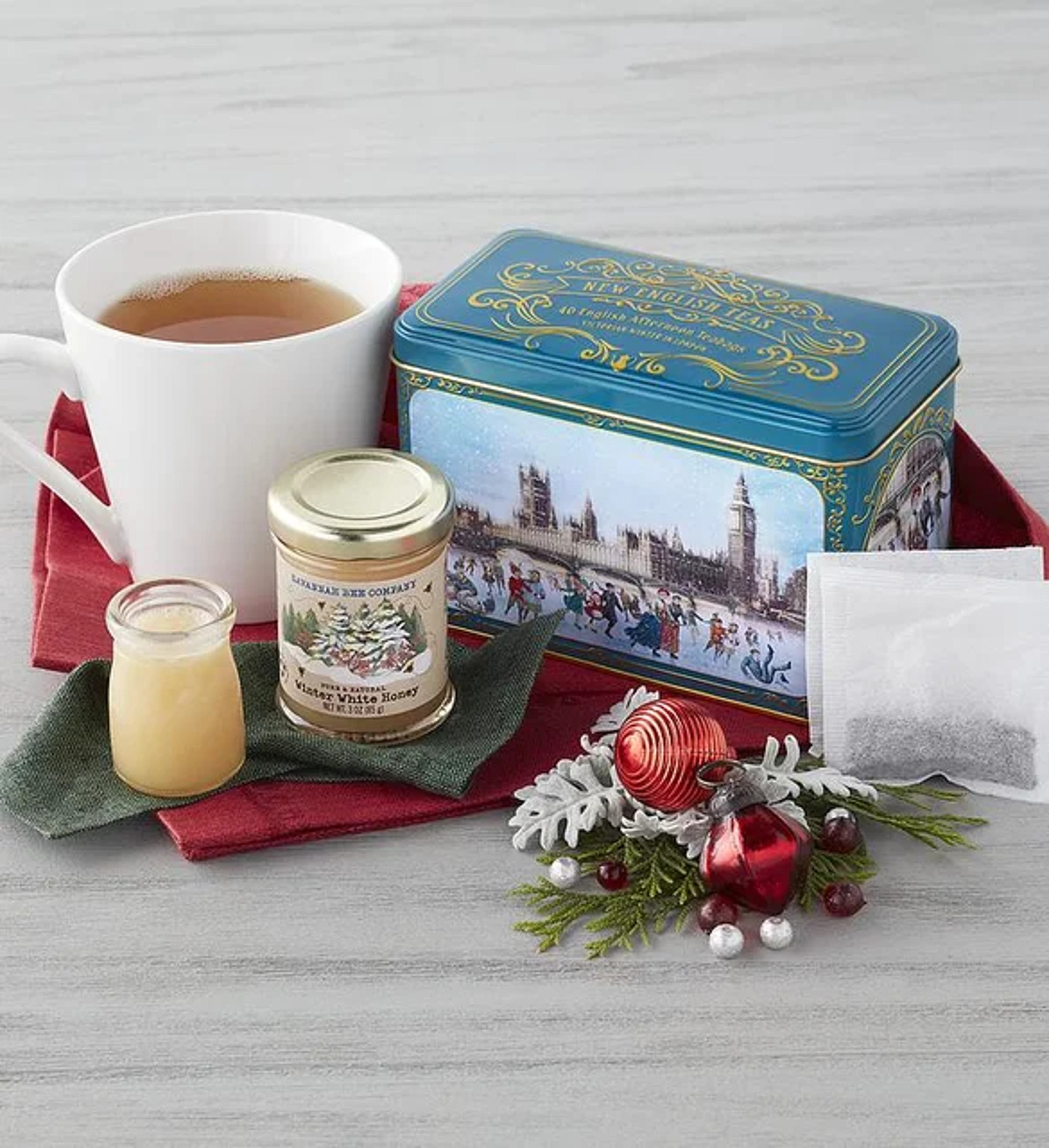 gifts under  holiday tea tin with winter honey