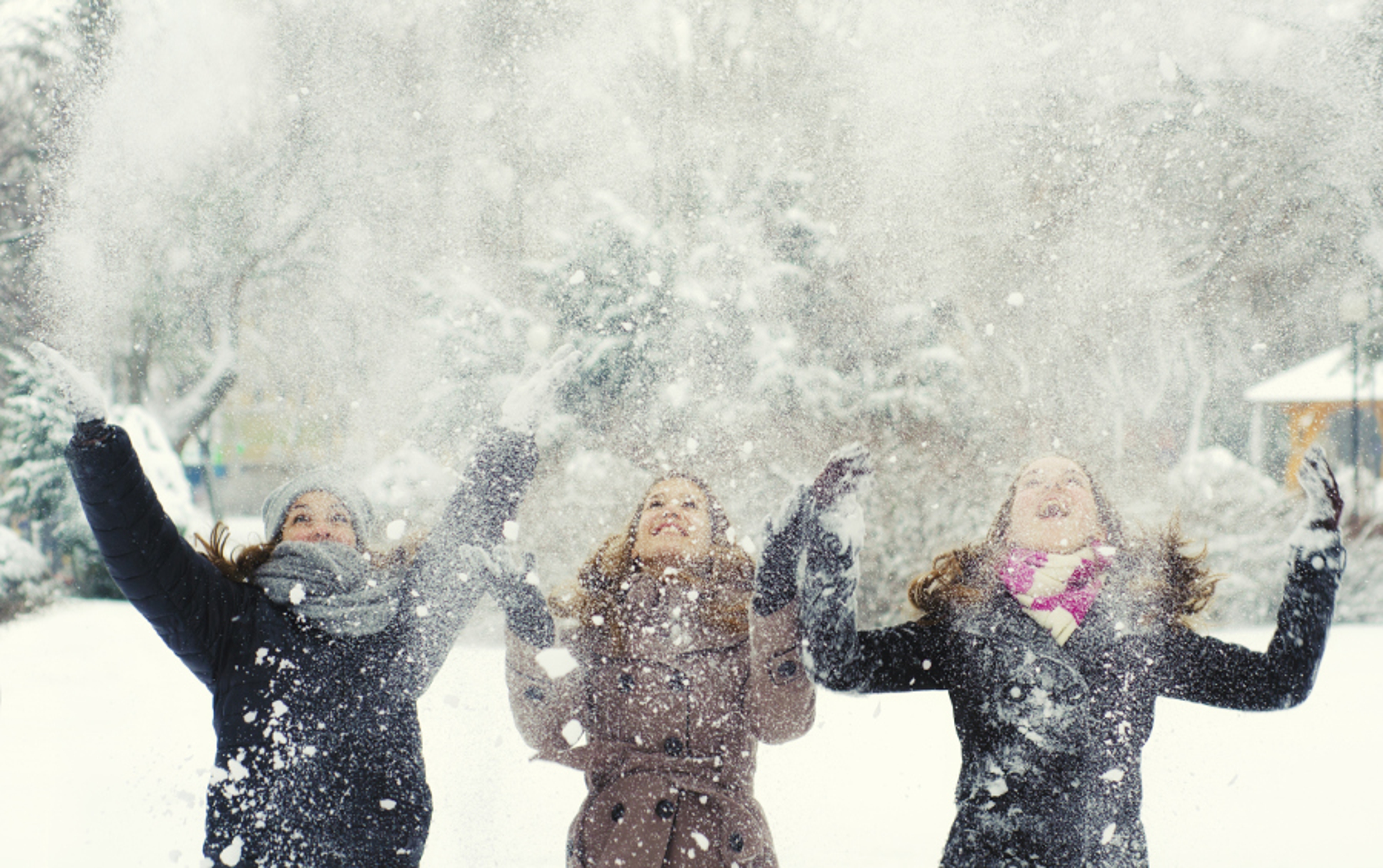 winter throwing snow