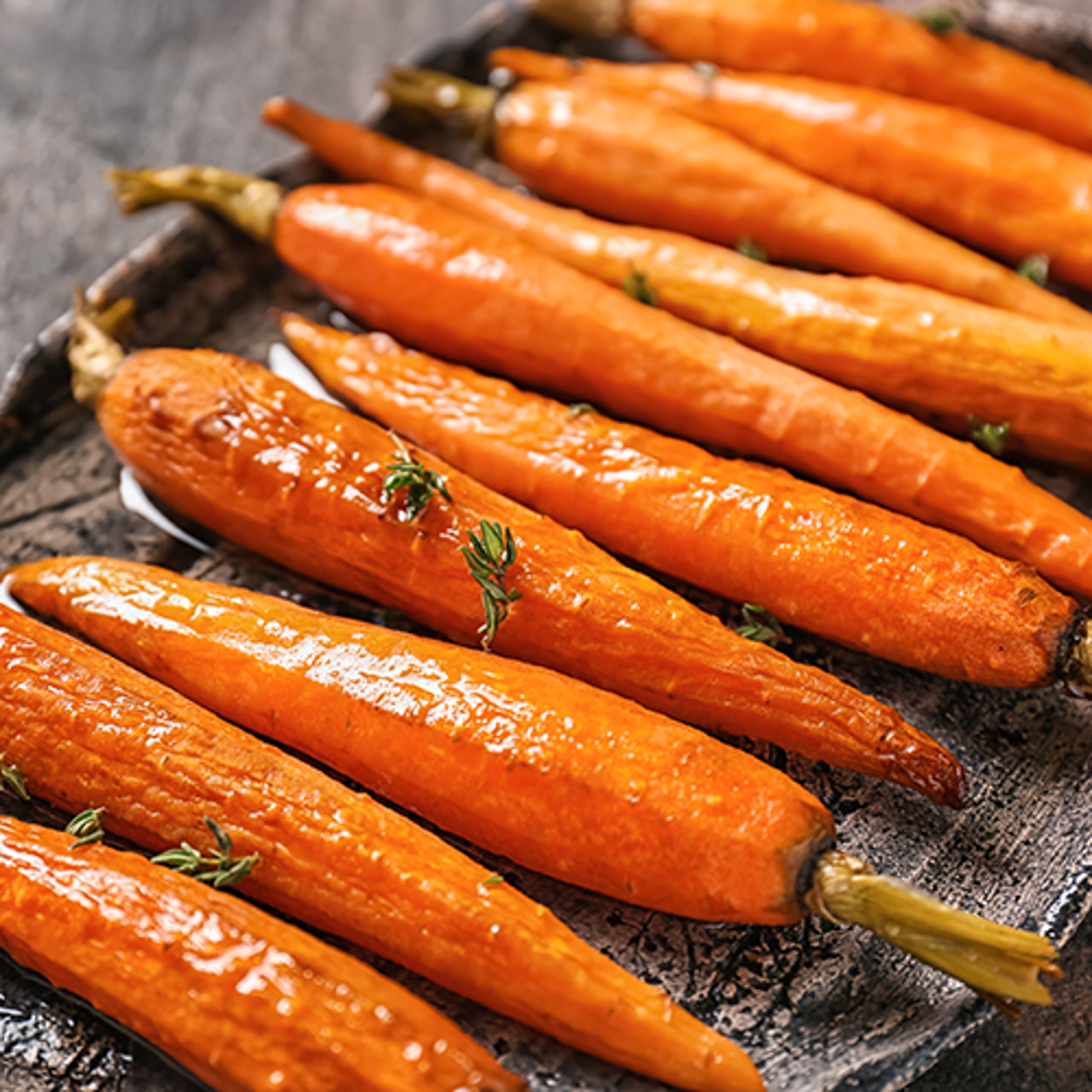 Carrot recipes with a platter of roasted carrots.