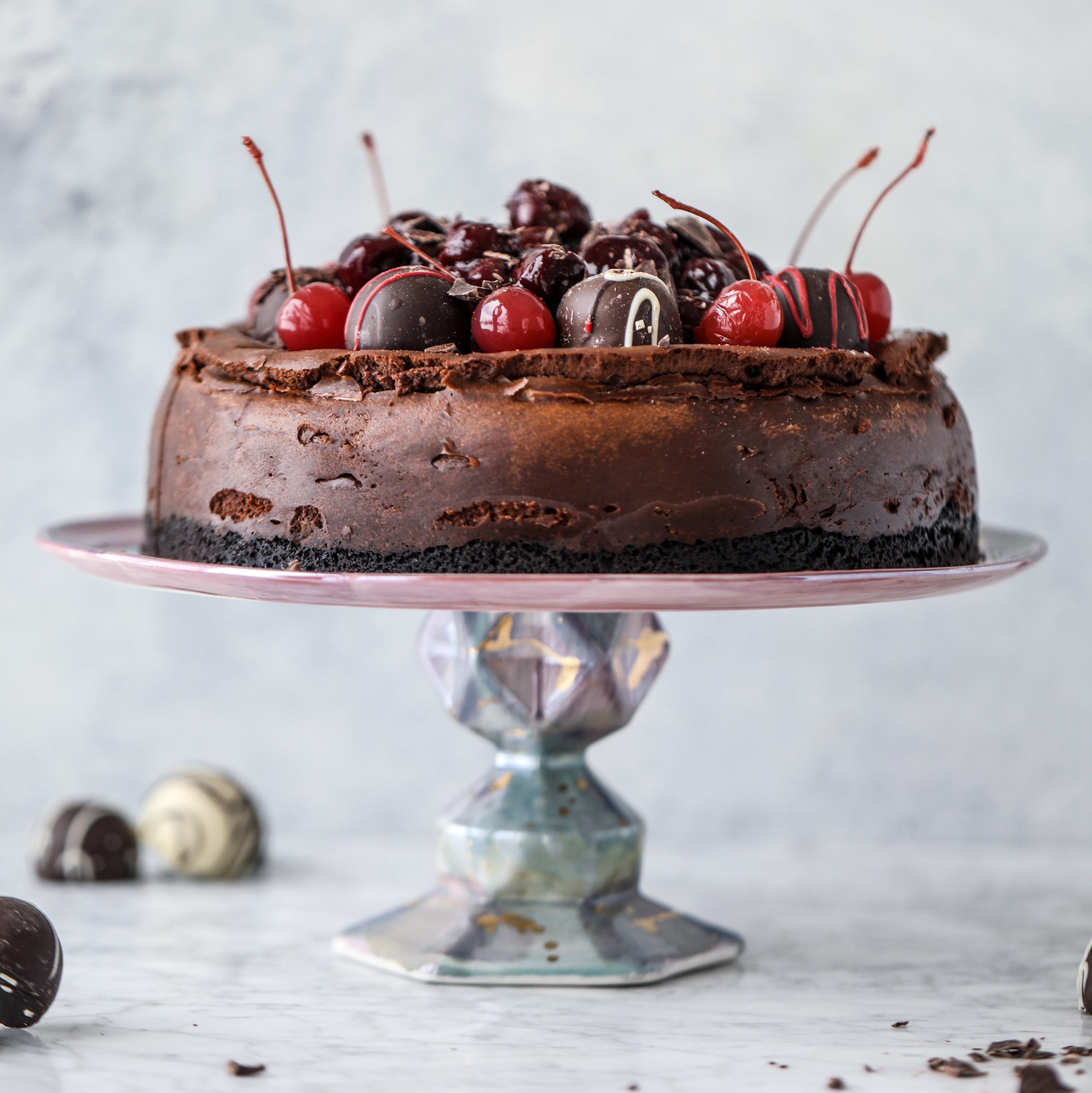 A photo of mother's day brunch ideas with a chocolate cherry cheesecake