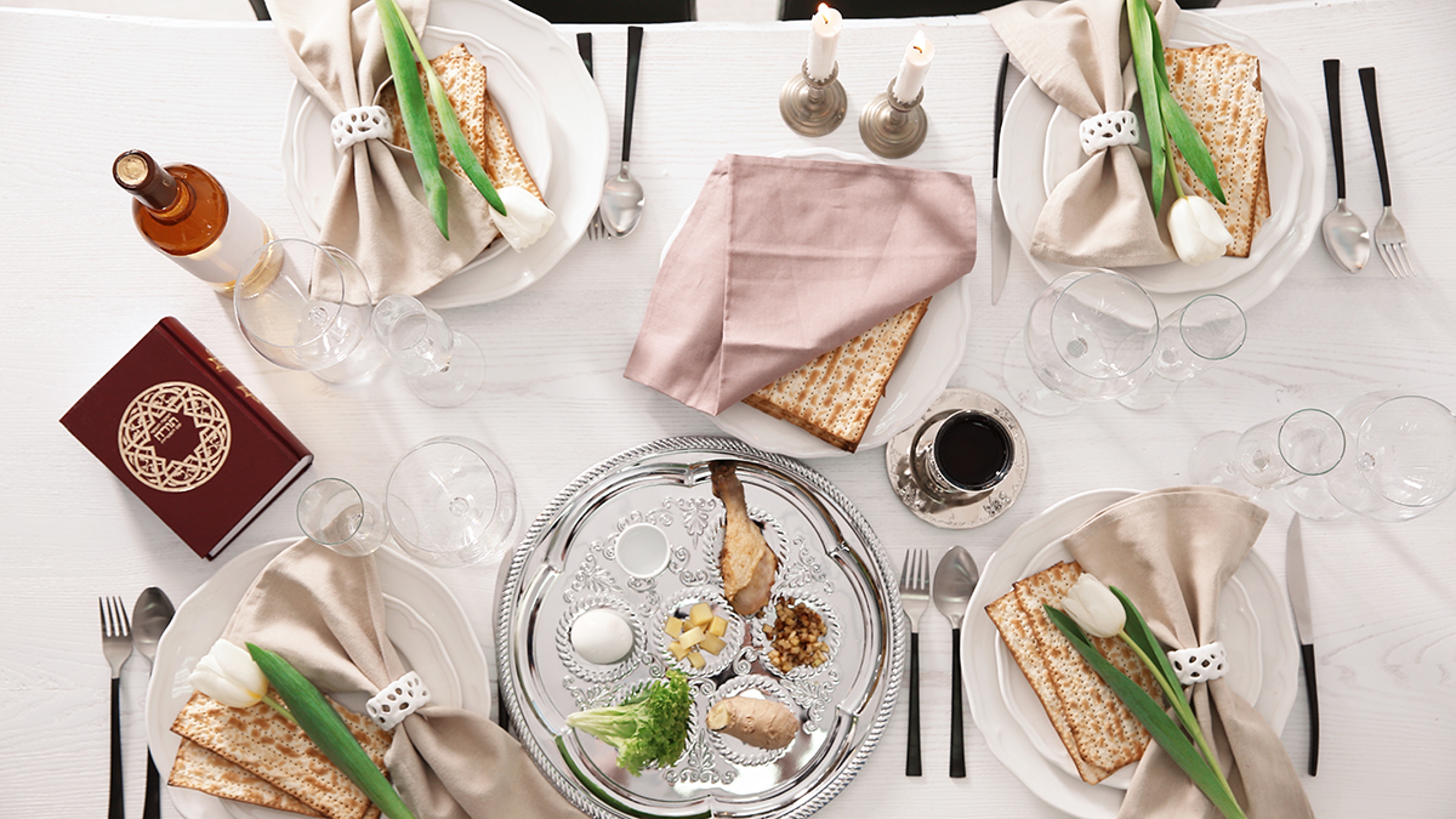 Festive Passover table setting with Torah, top view. Pesach celebration