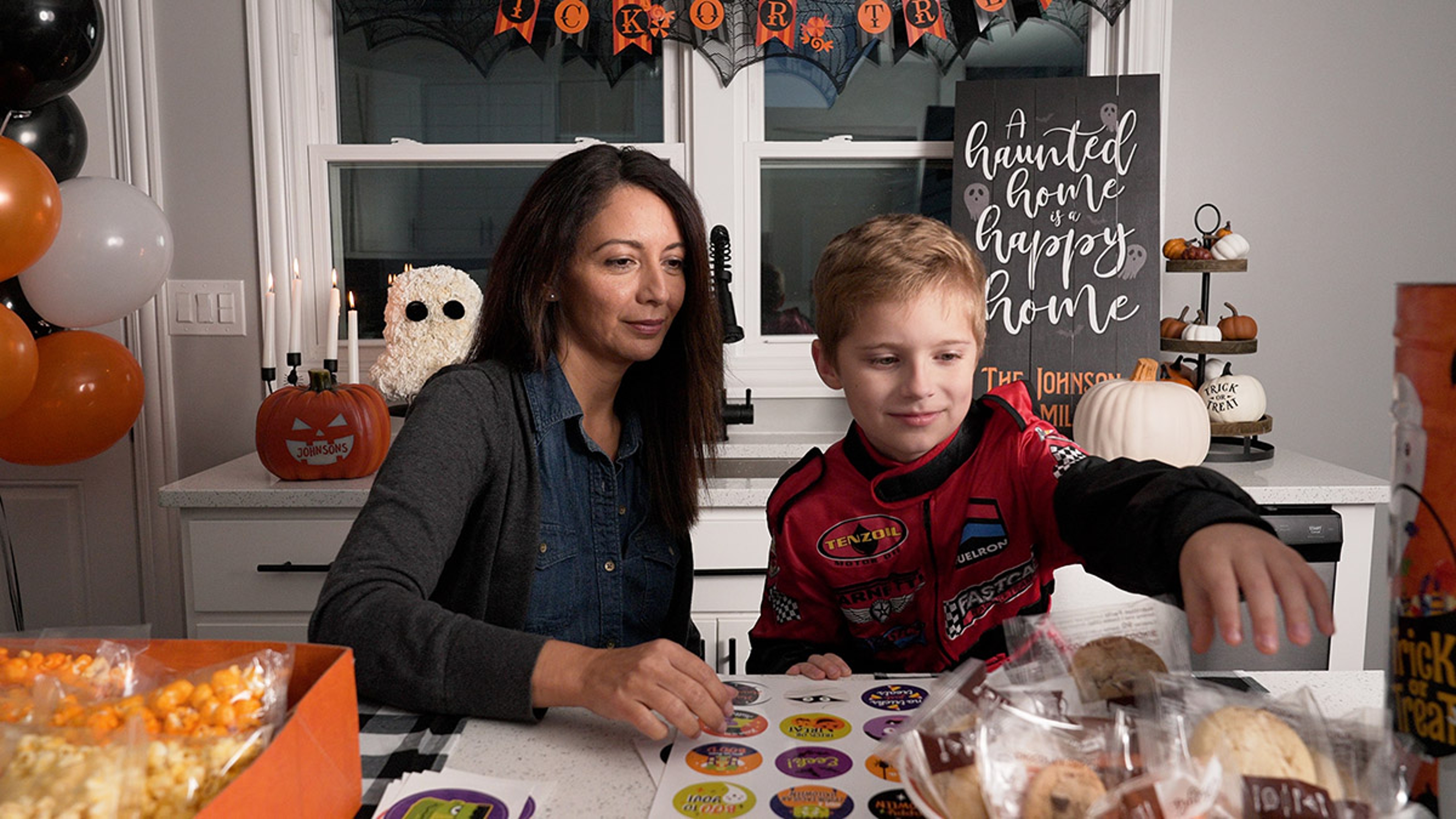 Article Cards Featured Image mother and son making boo bags together