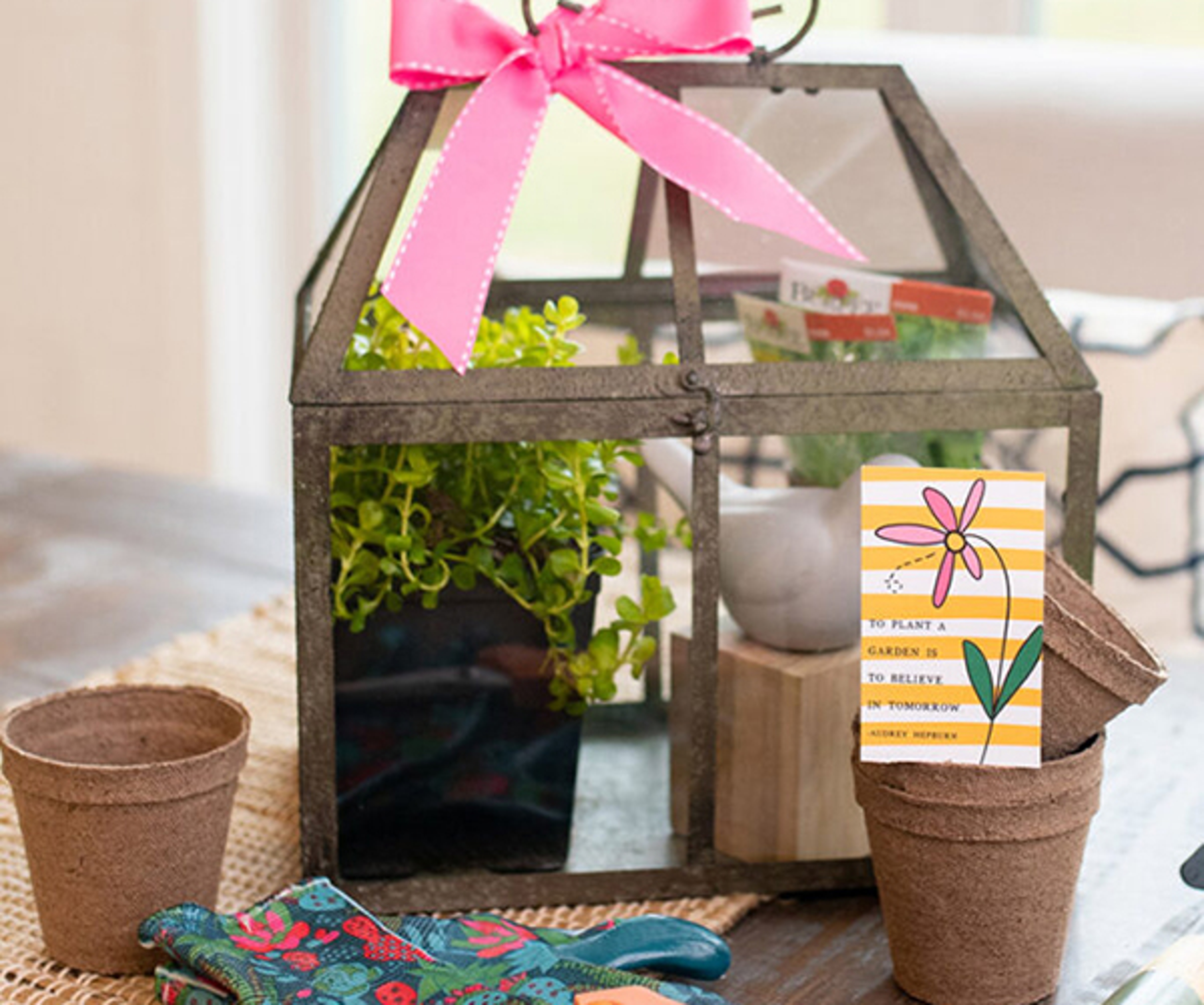 Spring birthday party ideas with a mini garden setup.