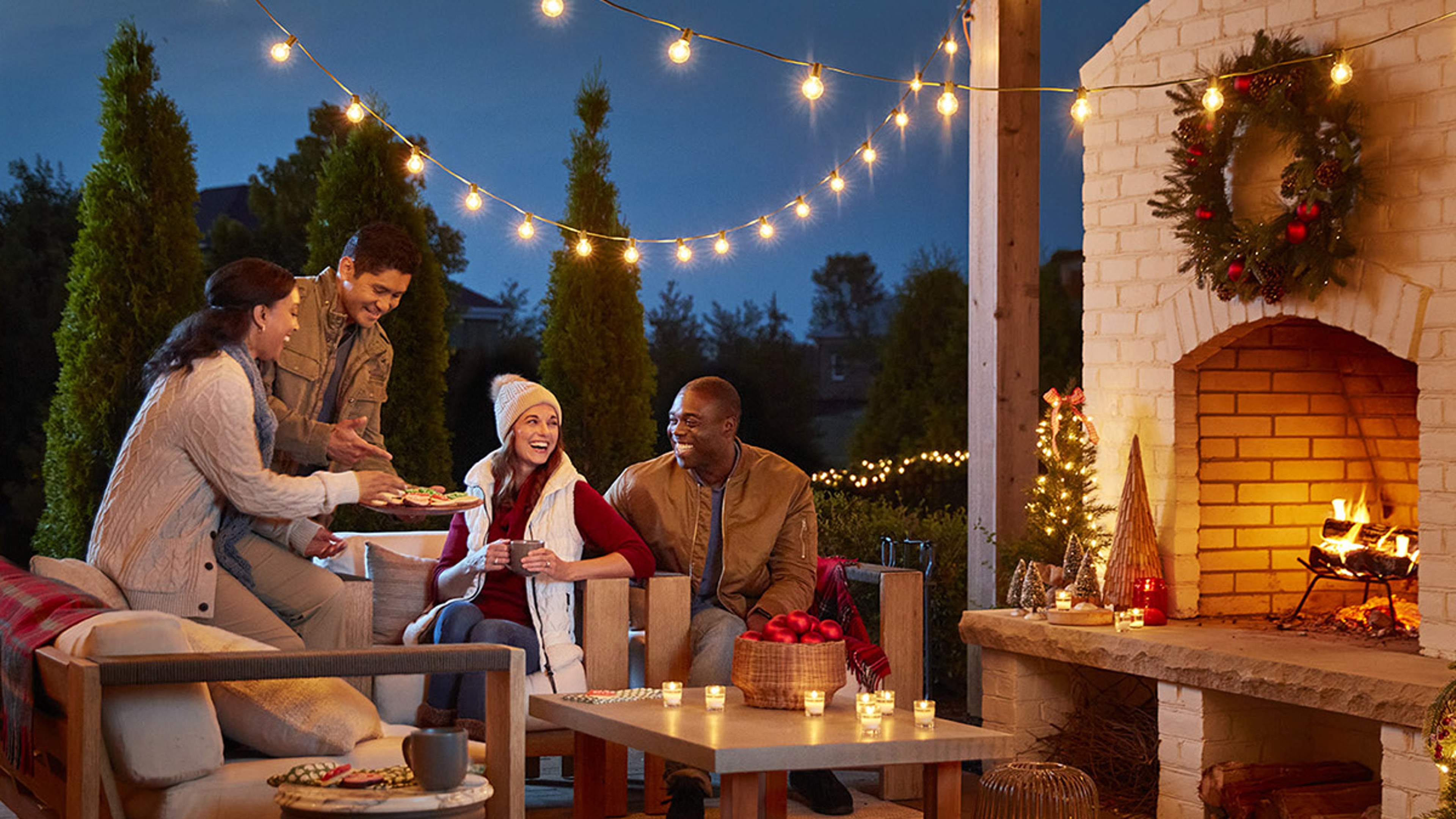 Article Cards Featured Image people at an outdoor party during winter solstice