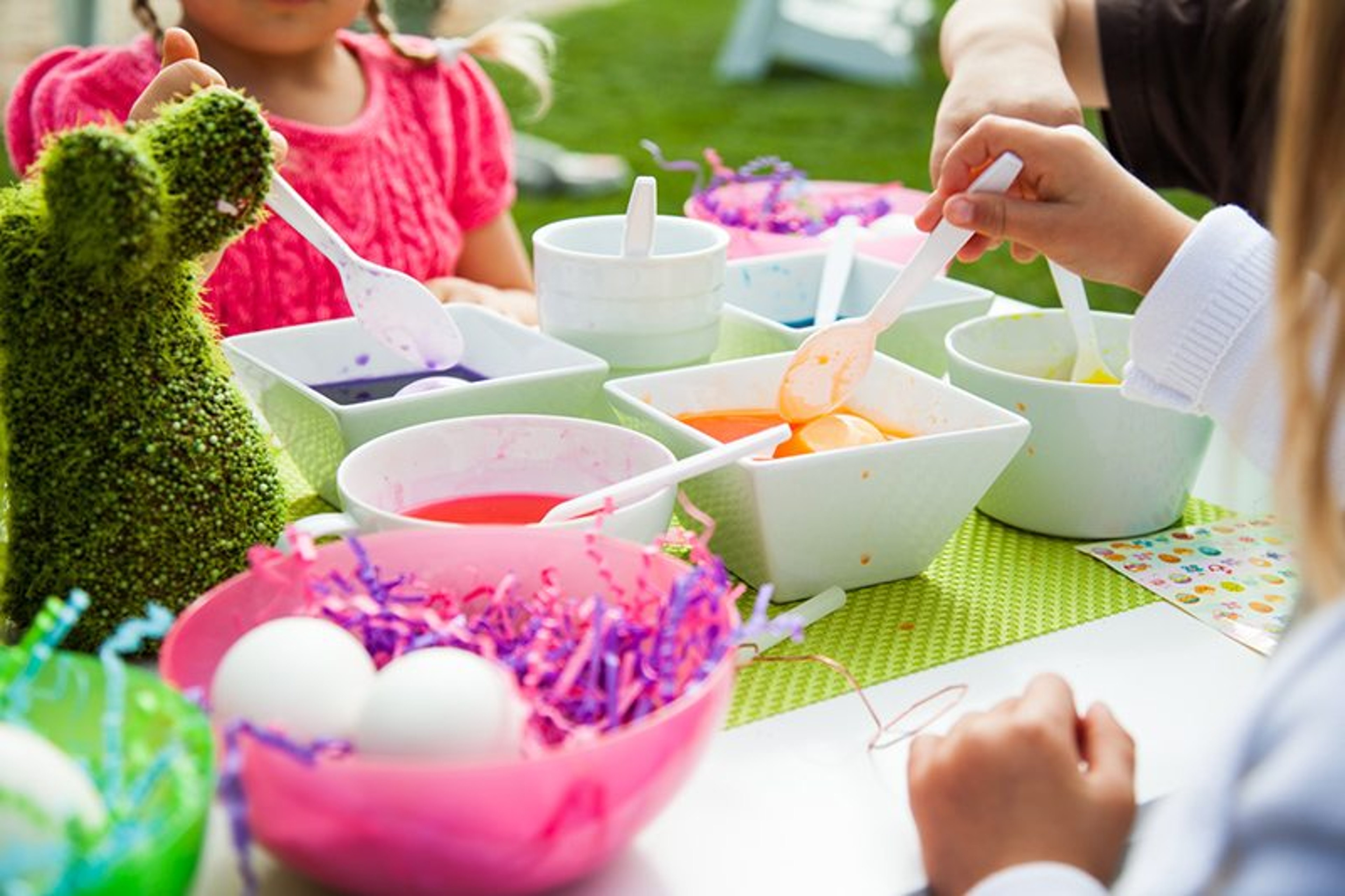Easter Egg Decorating Party Kids around the table dying easter eggs