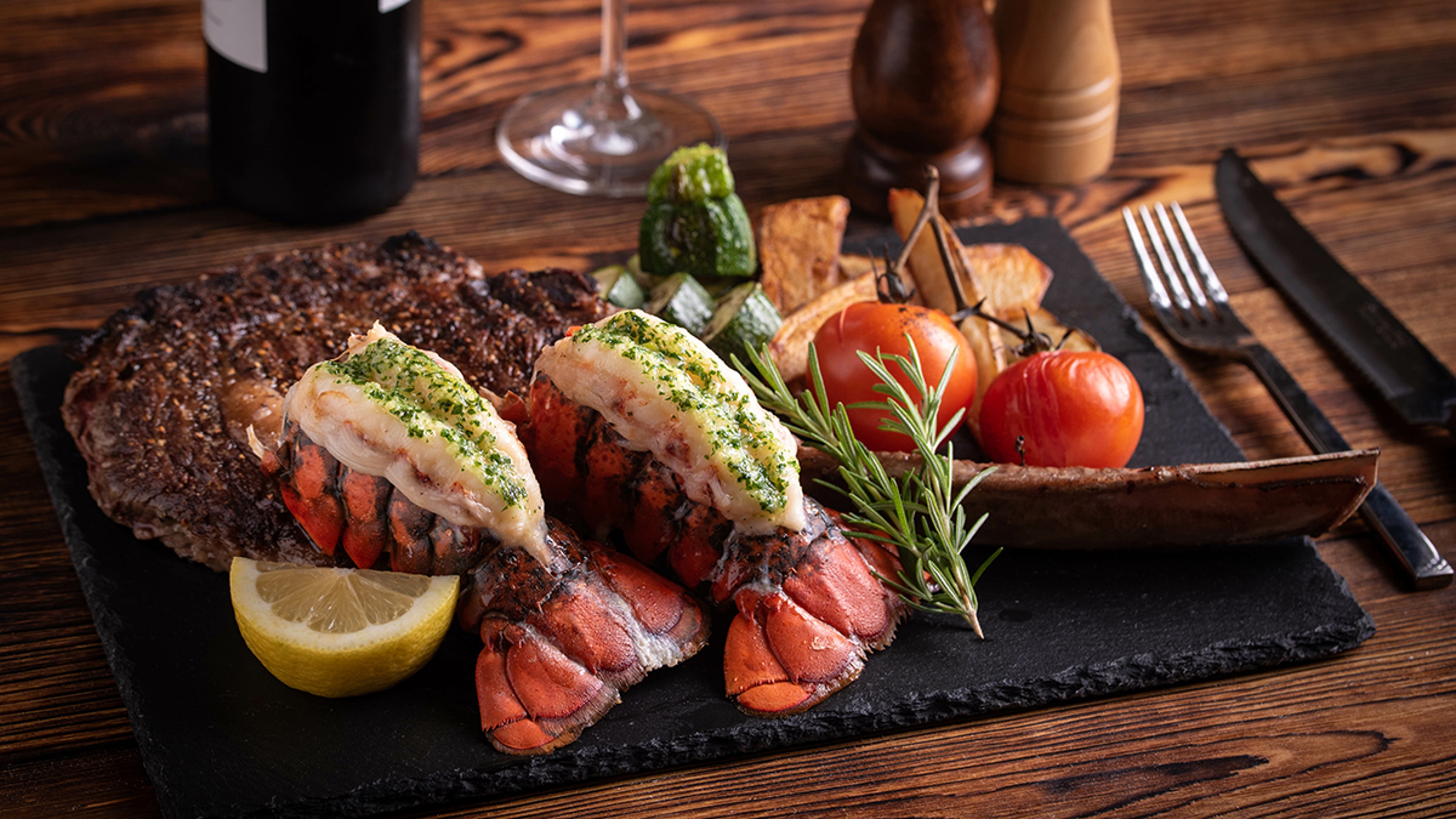 Article Cards Featured Image surf and turf with tomahawk rib eye steak and lobster tail