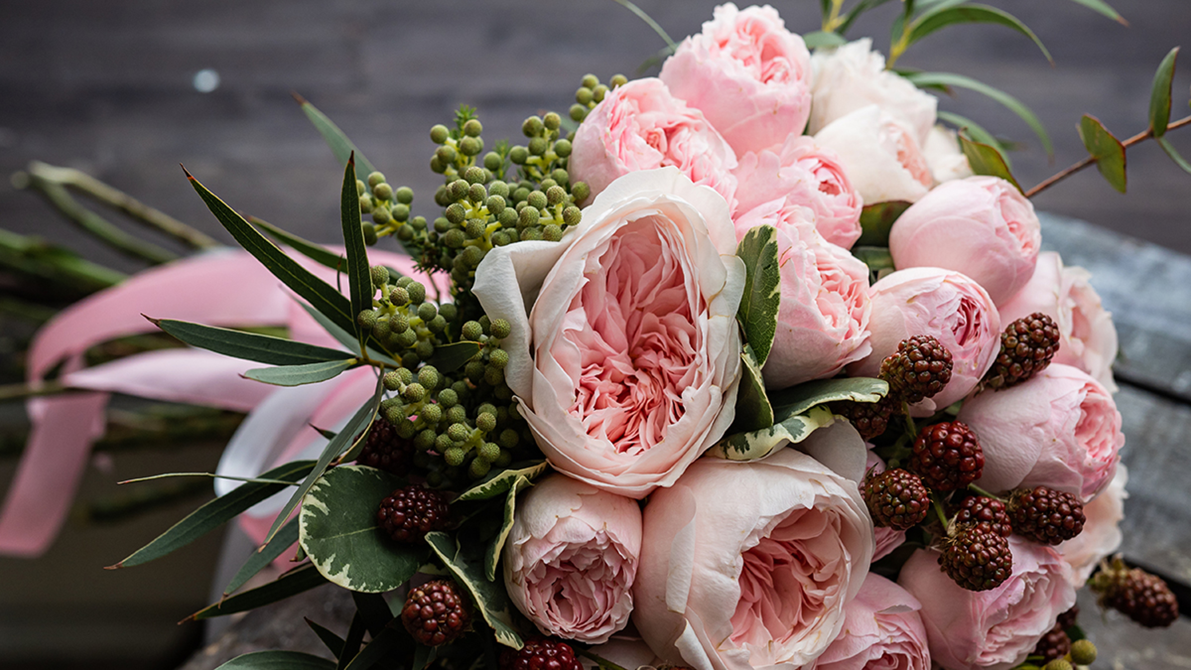 Article Cards Featured Image Beautiful wedding bouquet of shrub and peony gently pink roses.