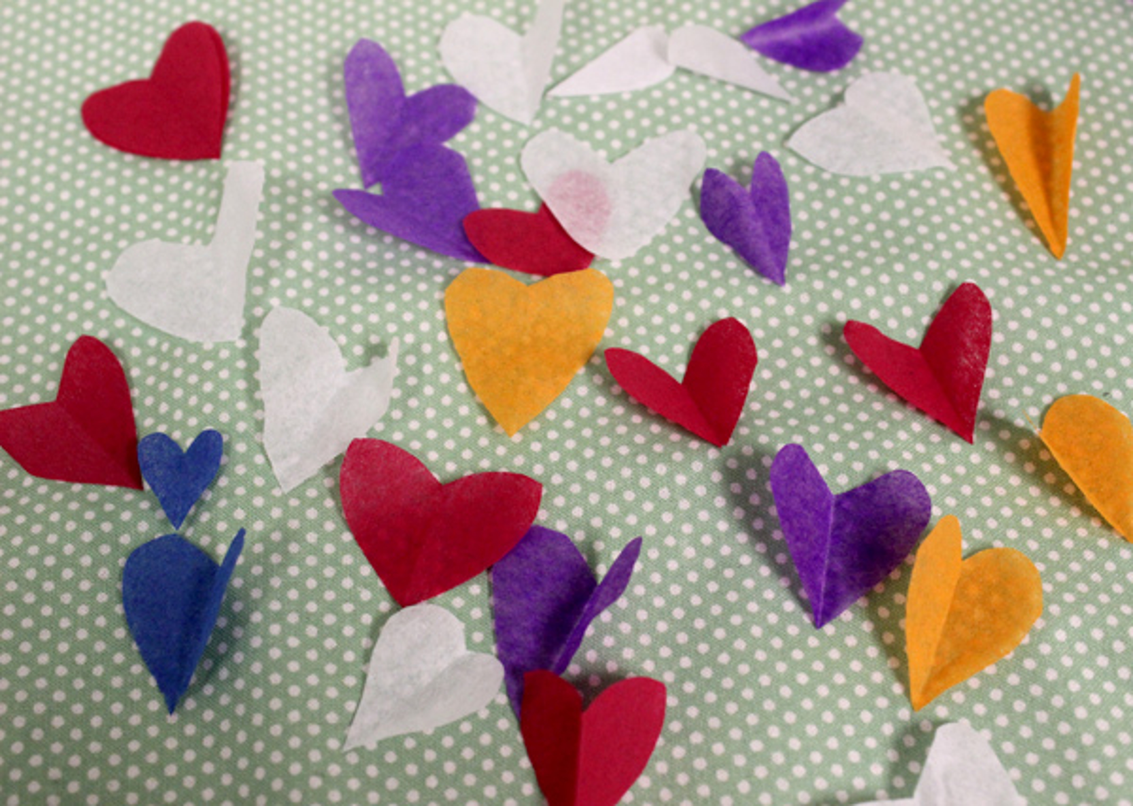 Paper hearts for Mother's Day crafts.