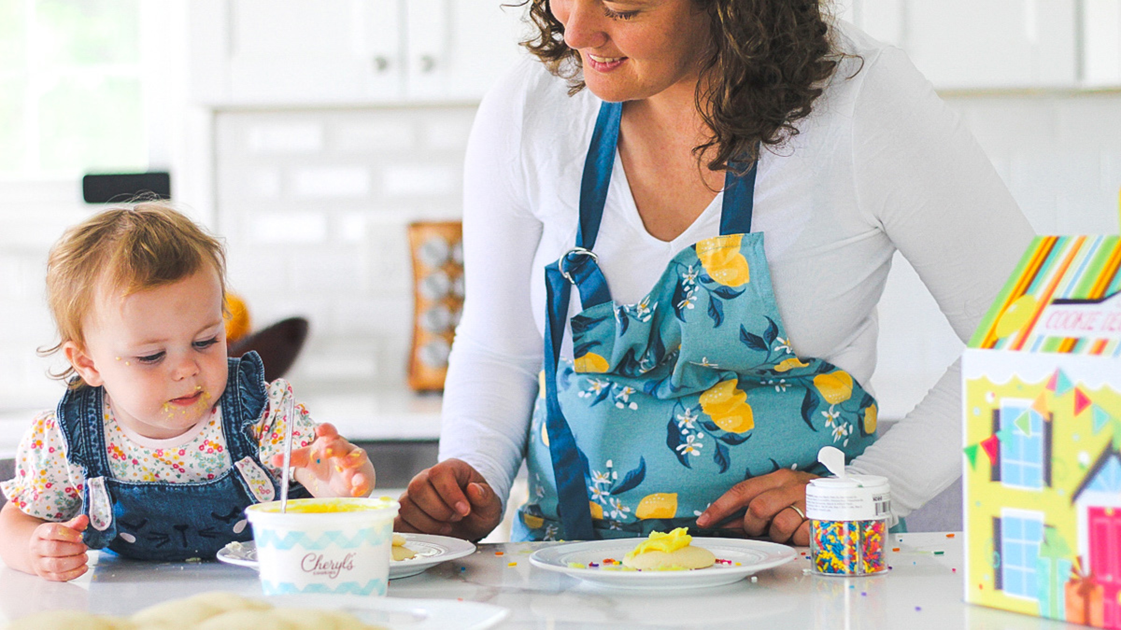 Article Cards Featured Image mother decorating cookies with young daughter