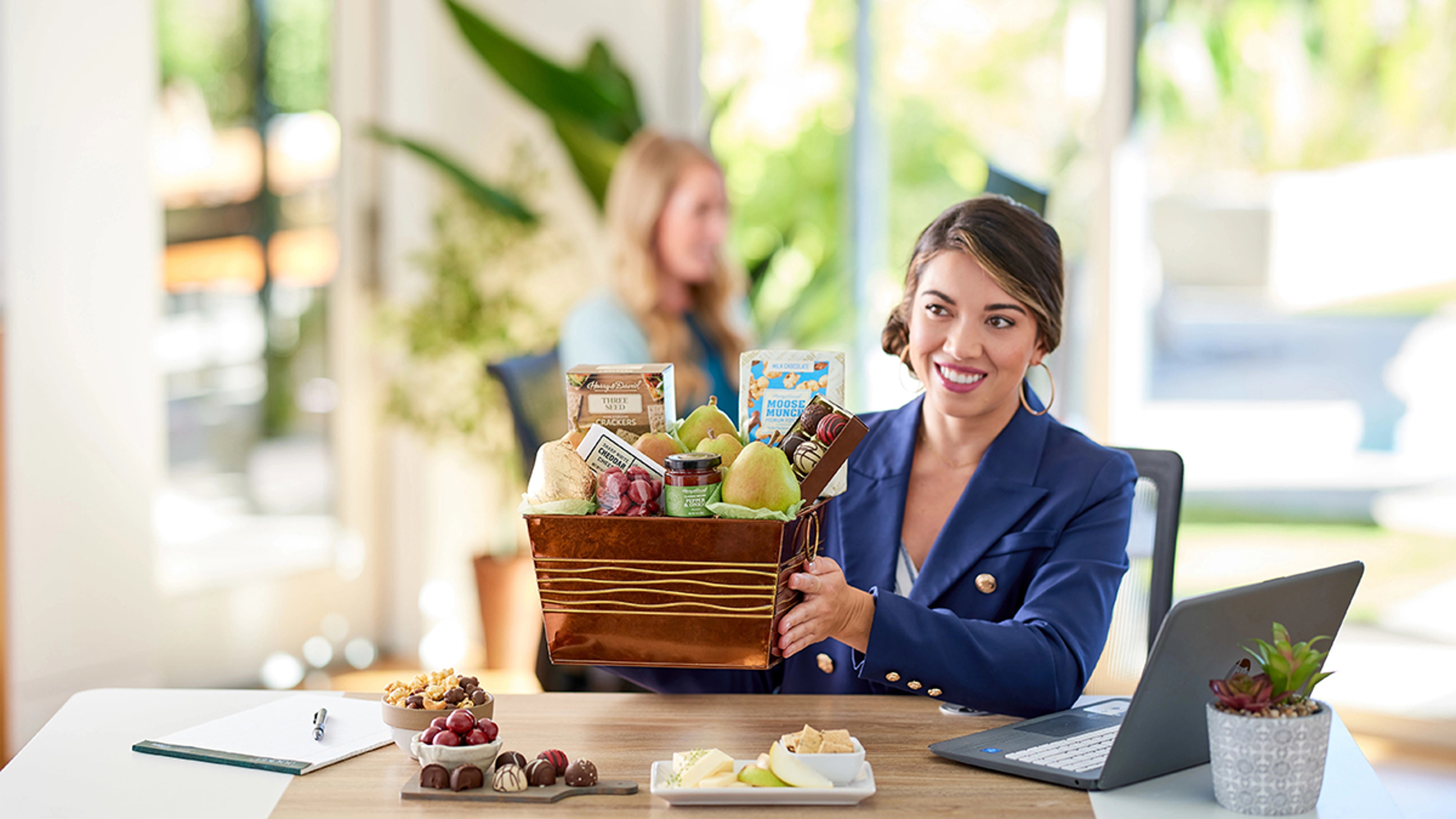 Woman accepting an Employee Appreciation gift.